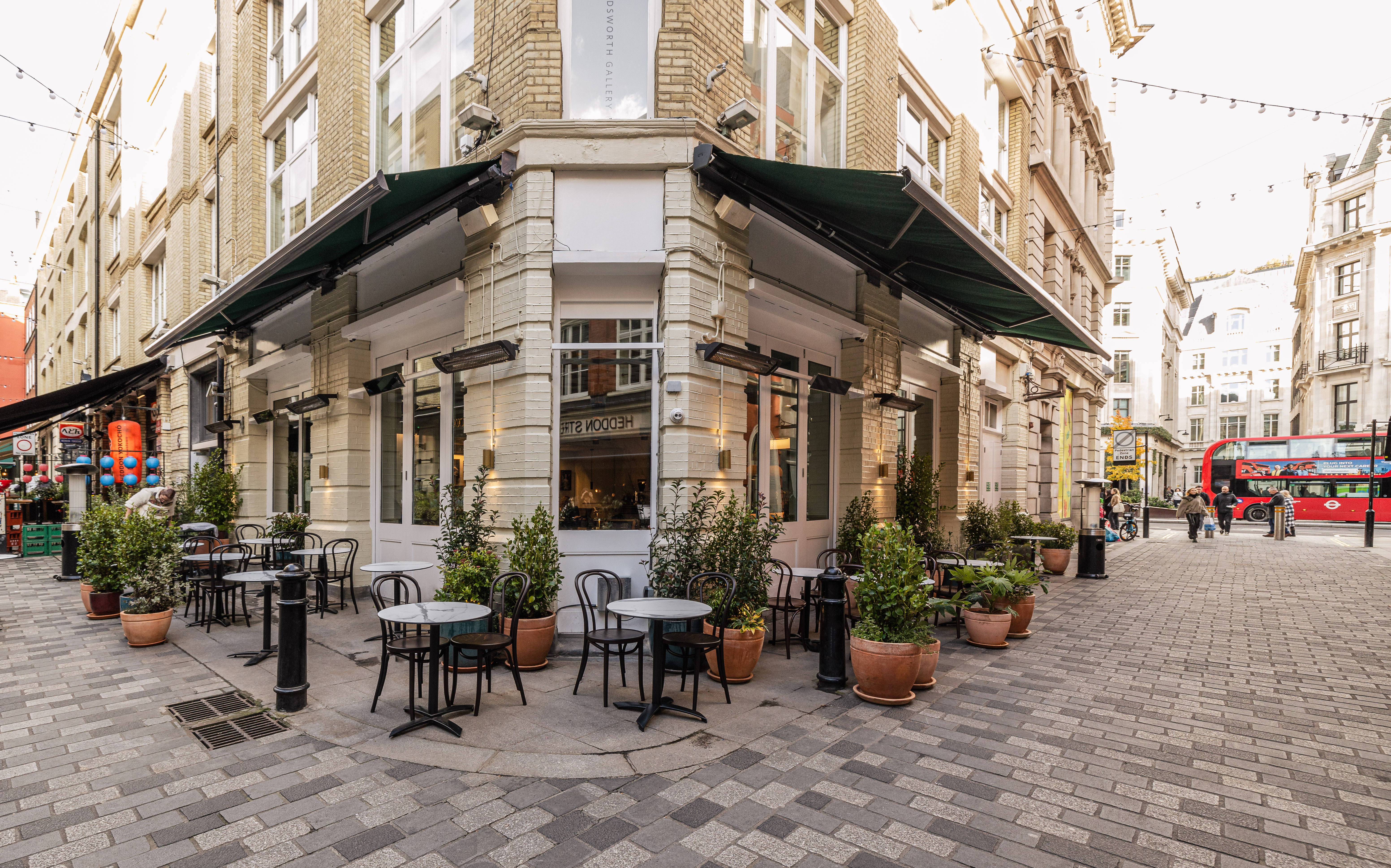 Charming outdoor café venue at Ziggy Green, perfect for networking events and casual gatherings.