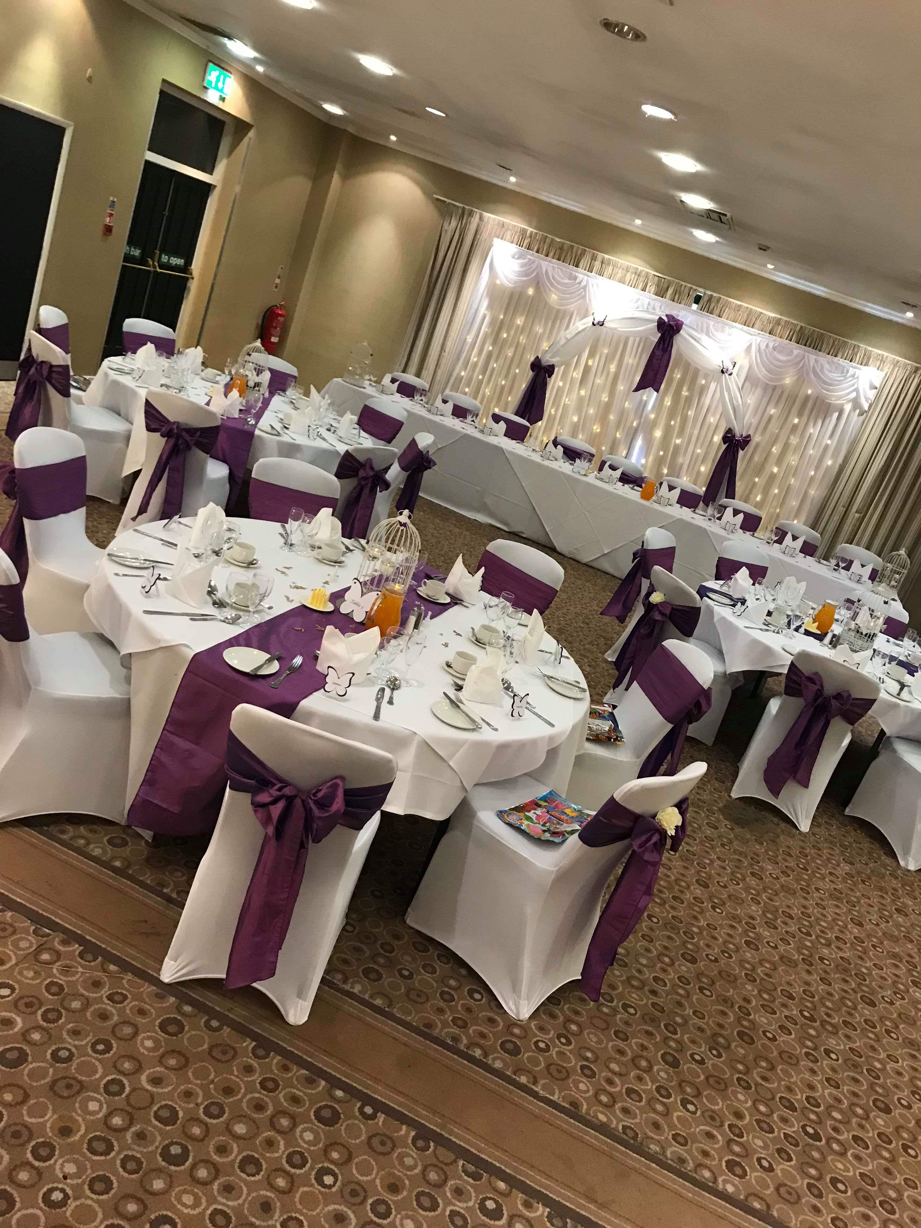 William Duesbury at elegantly arranged Holiday Inn event space for weddings and formal gatherings.