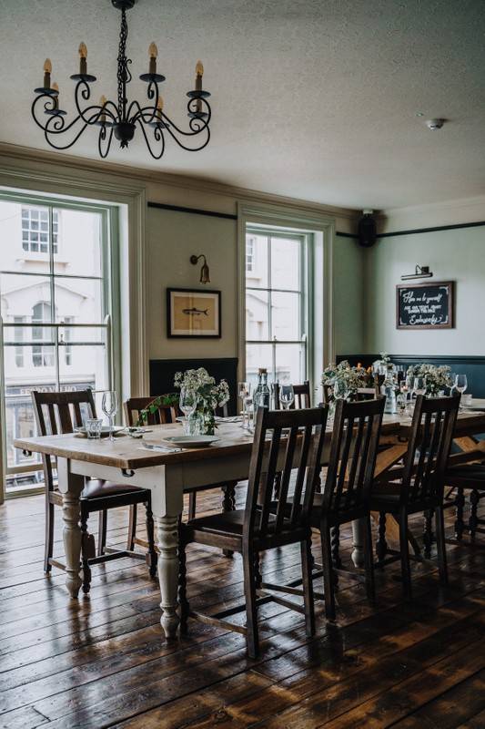 "Intimate dining table in The Hardy Room, perfect for small events and meetings."