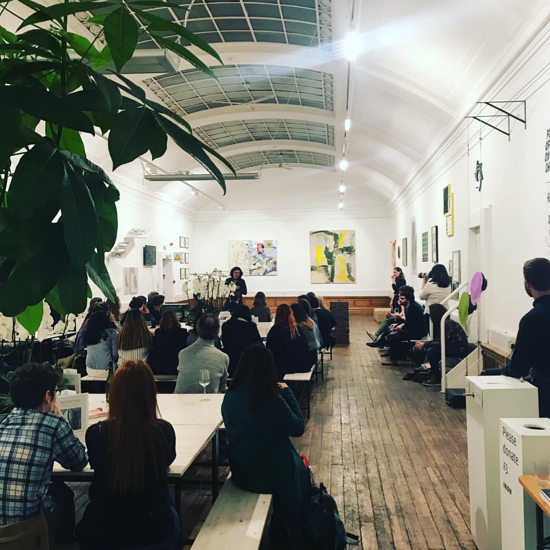 Modern event space at Medicine Gallery with engaged audience, ideal for workshops and presentations.