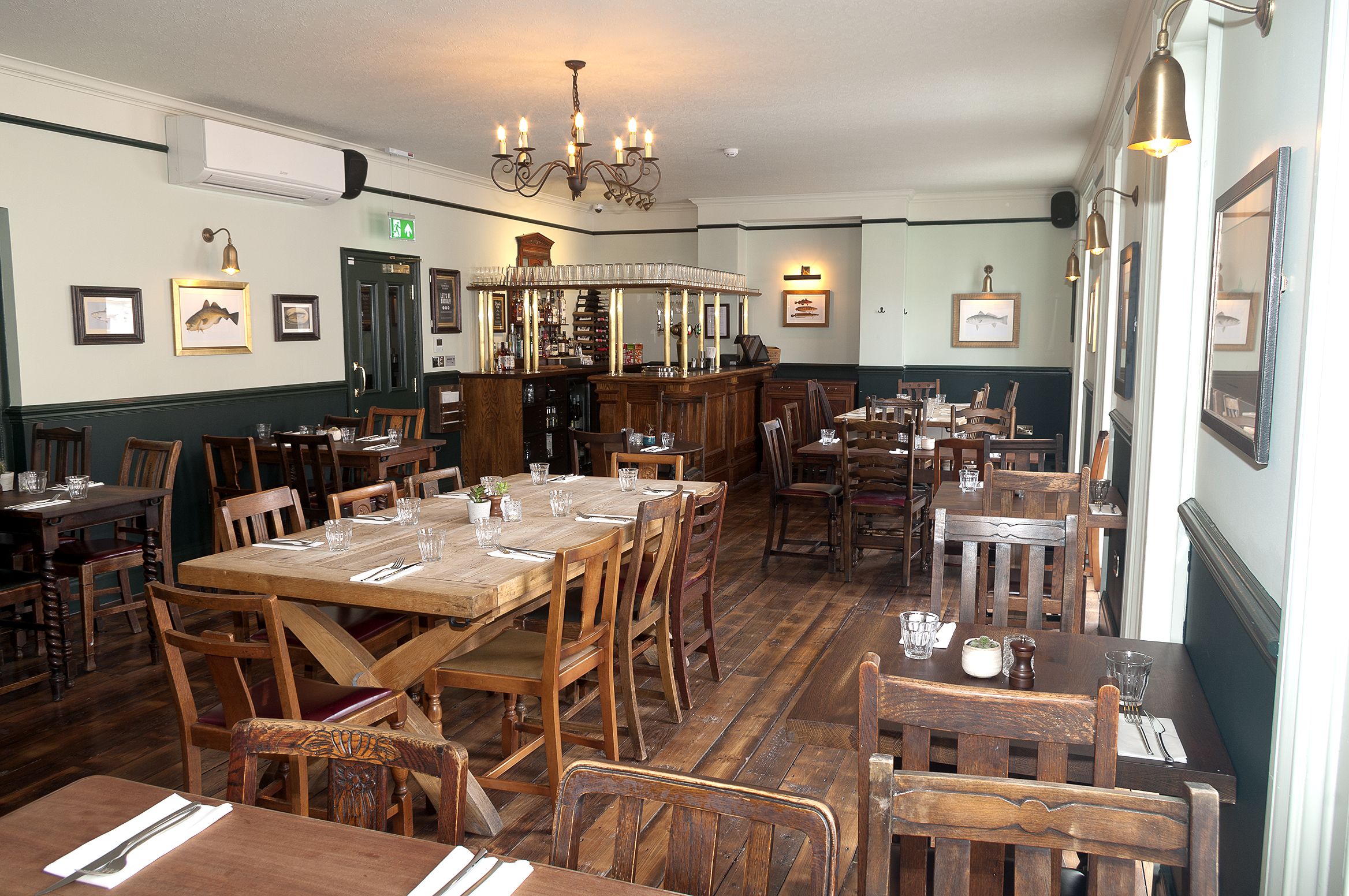 Cozy restaurant setting in The Hardy Room, perfect for intimate gatherings and events.