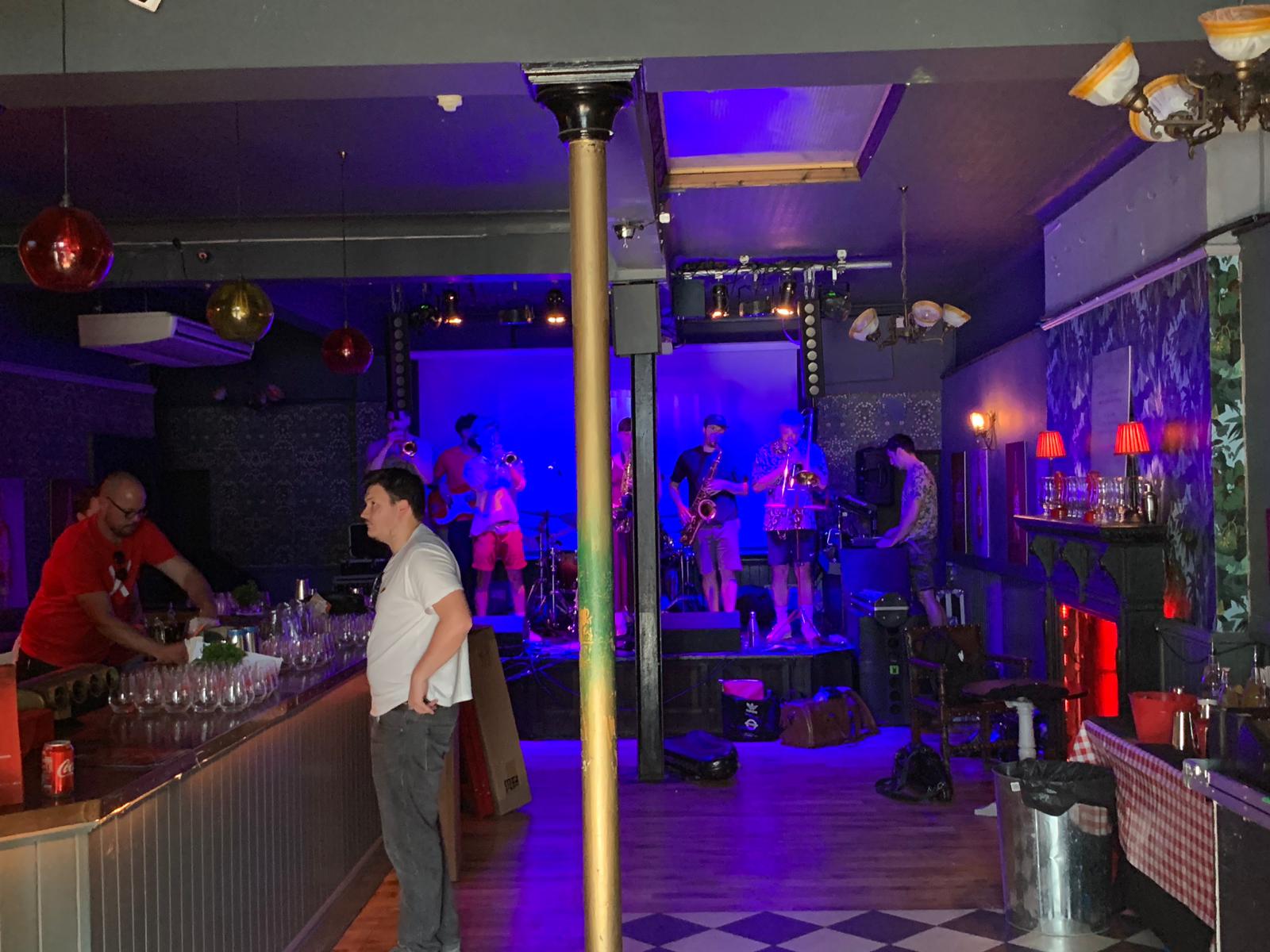 Vibrant event space at The Macbeth bar, ideal for live performances and networking.