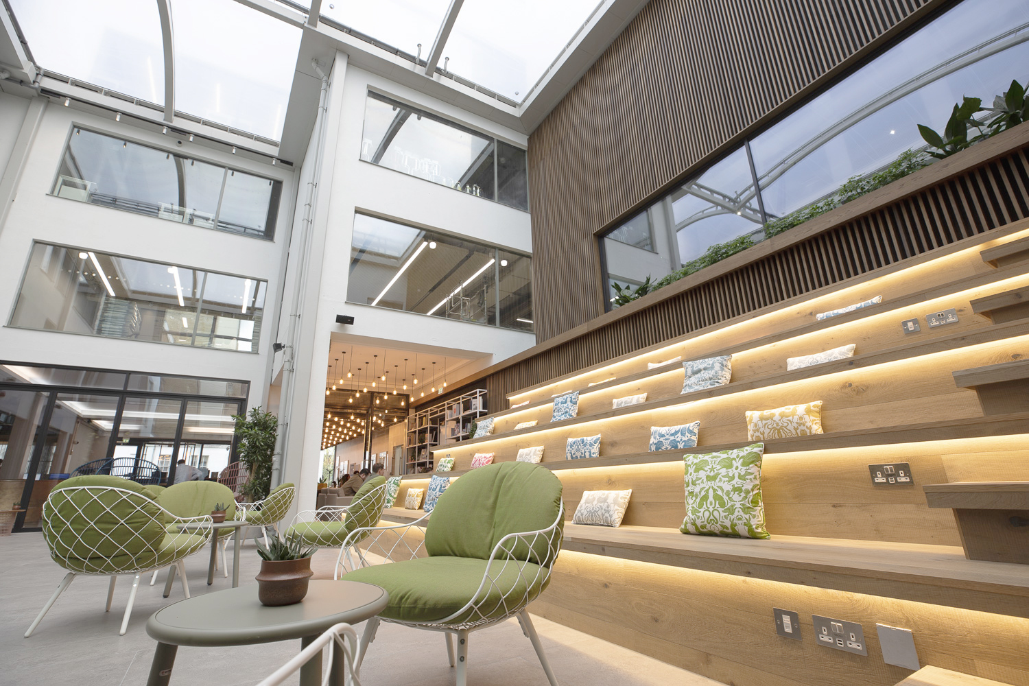 Spitalfields Conservatory: modern meeting space with glass ceiling for events and networking.