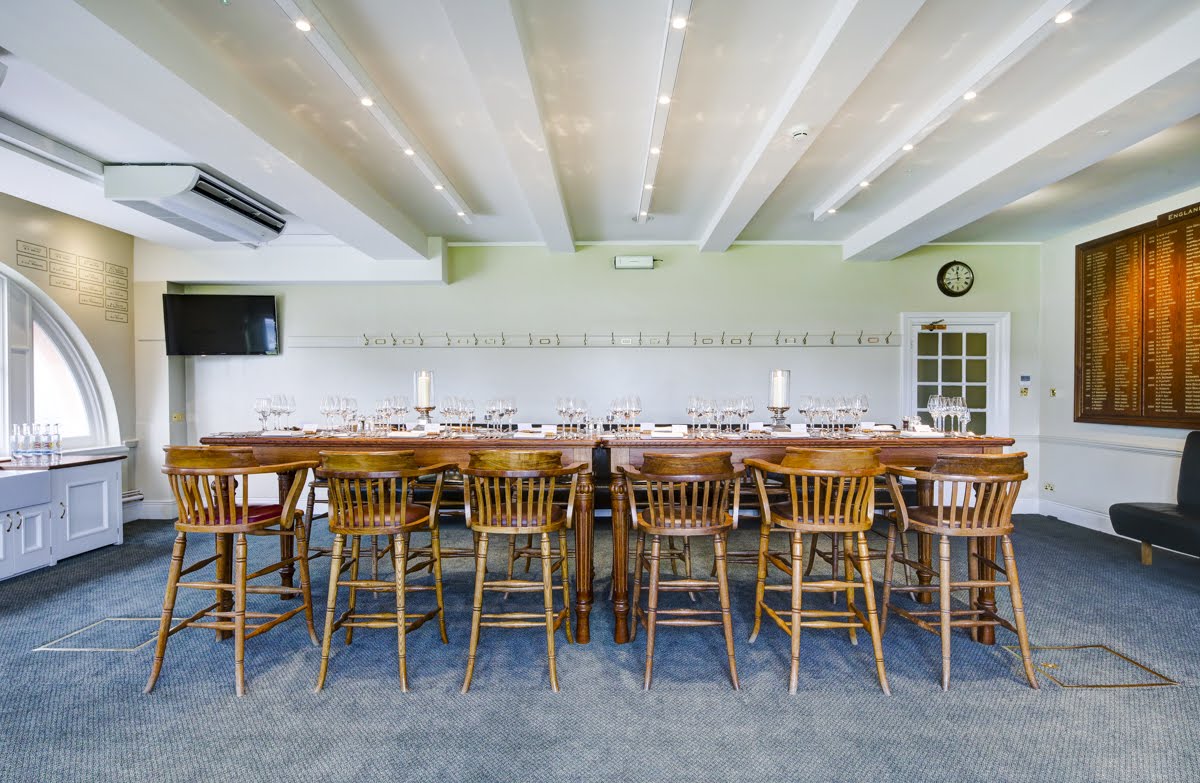 Home Dressing Room at Lord's Cricket Ground, featuring a large wooden table for corporate events.