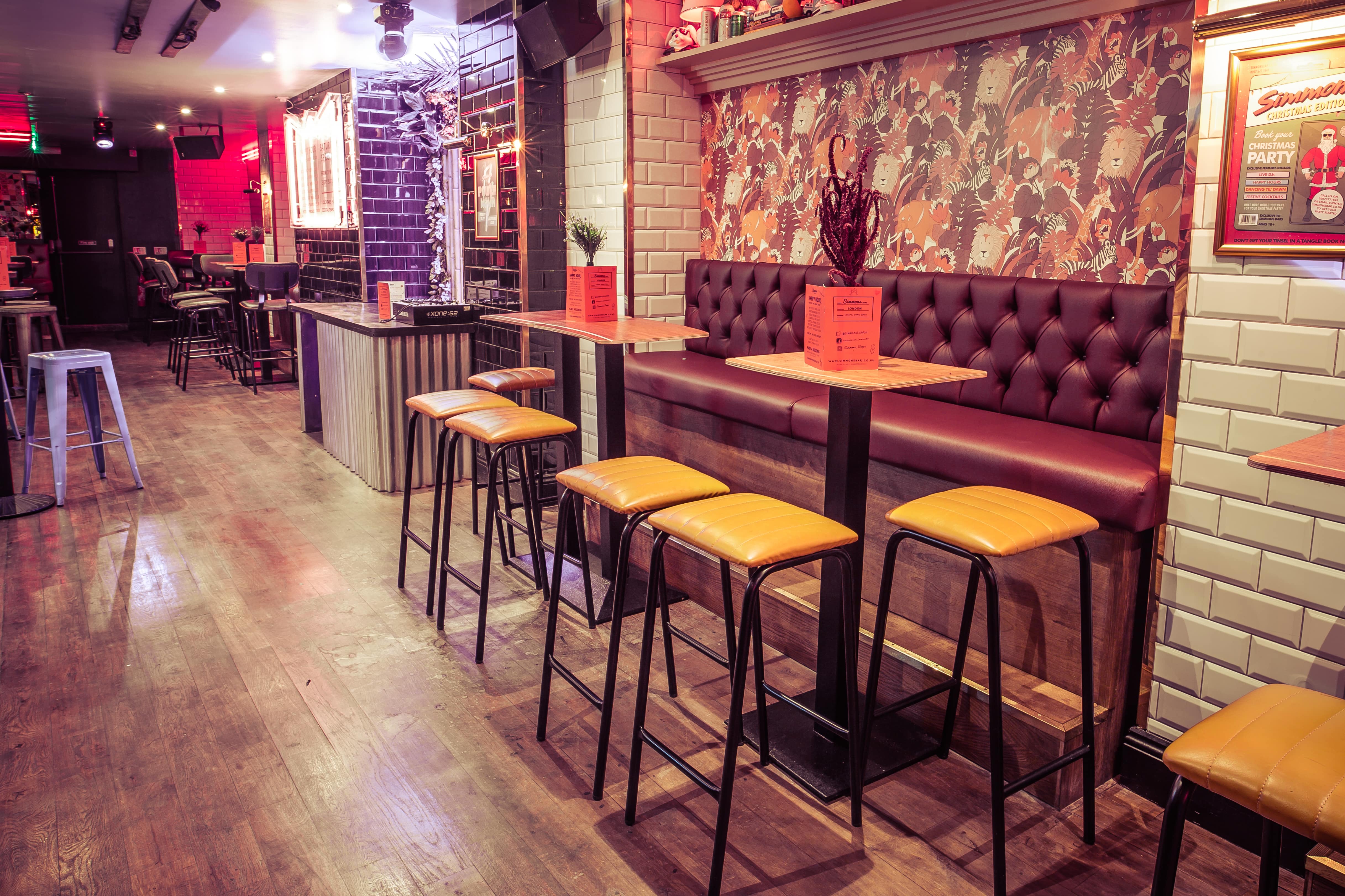 Simmons Piccadilly Circus bar with vibrant decor, ideal for networking and social events.