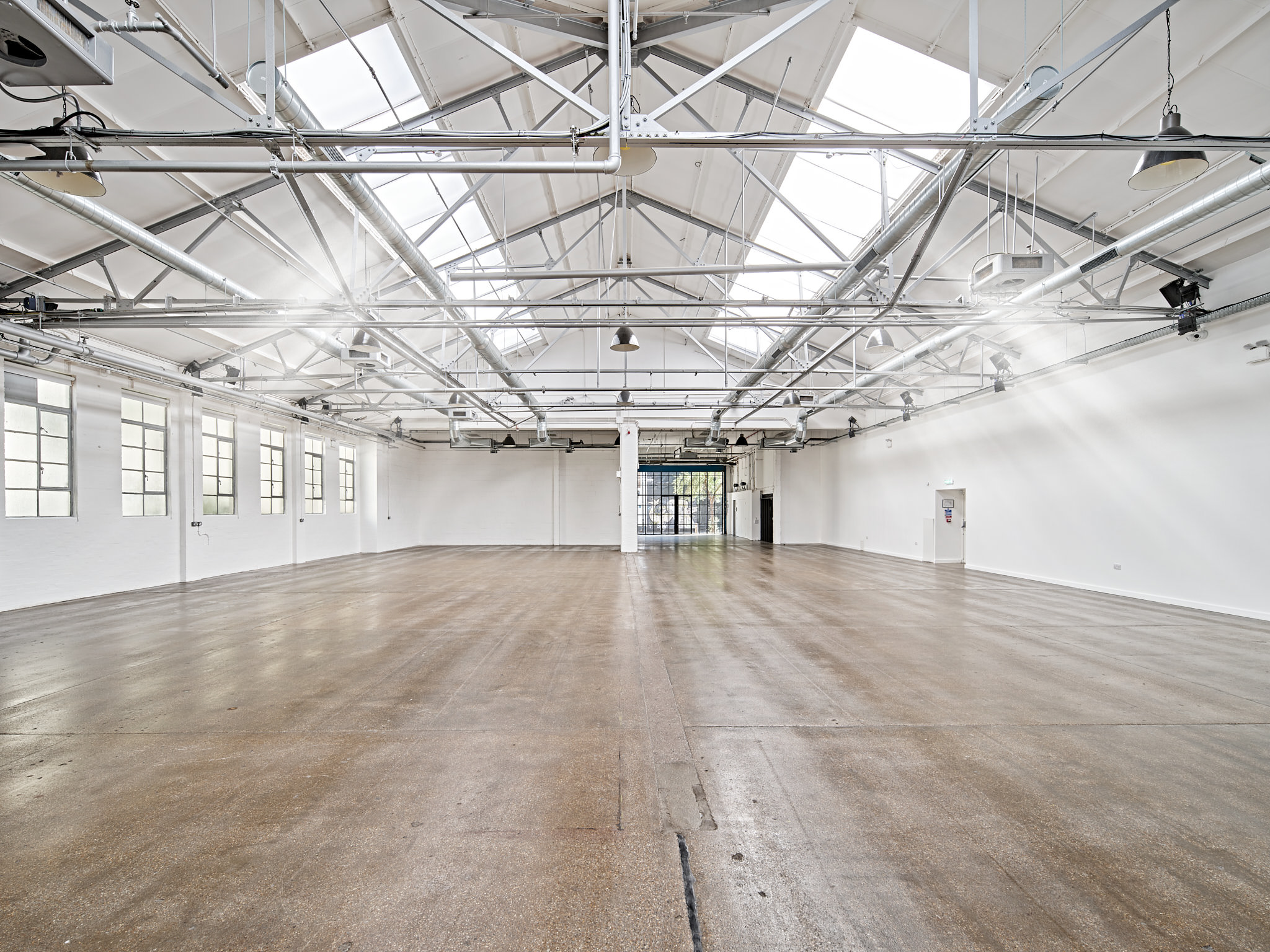 Spacious event venue with high ceilings in Protein Studios for conferences and workshops.