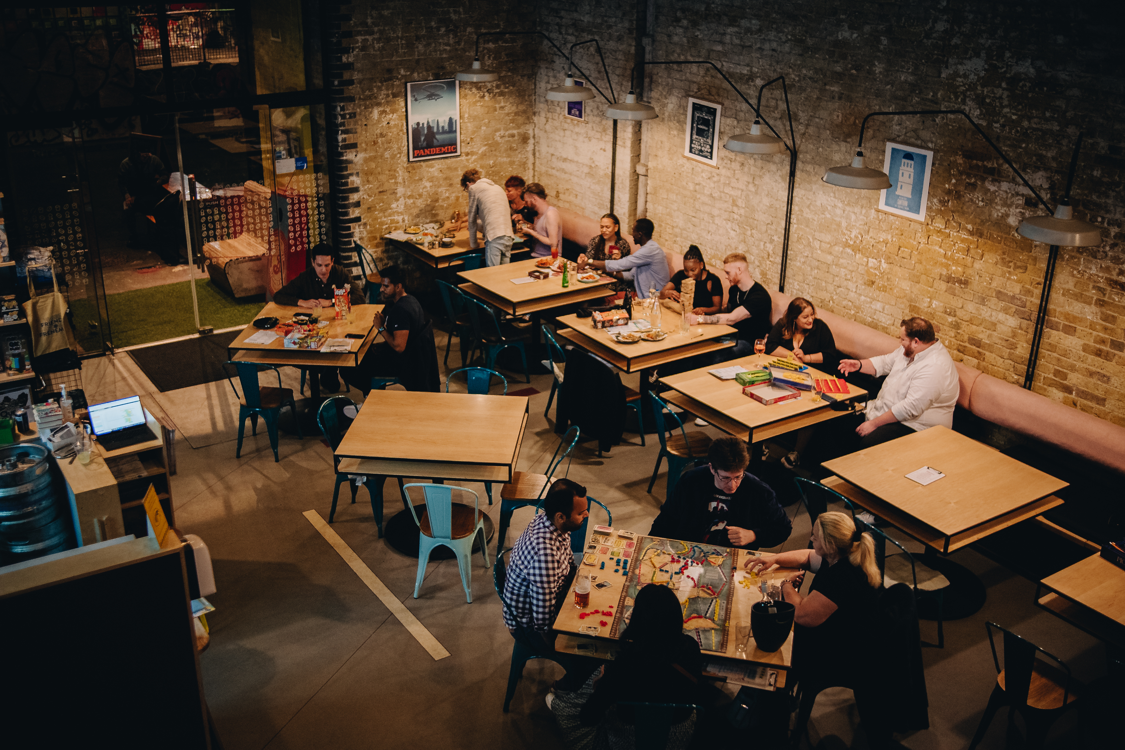 Vibrant event space at Draughts Waterloo with rustic decor for networking and gatherings.