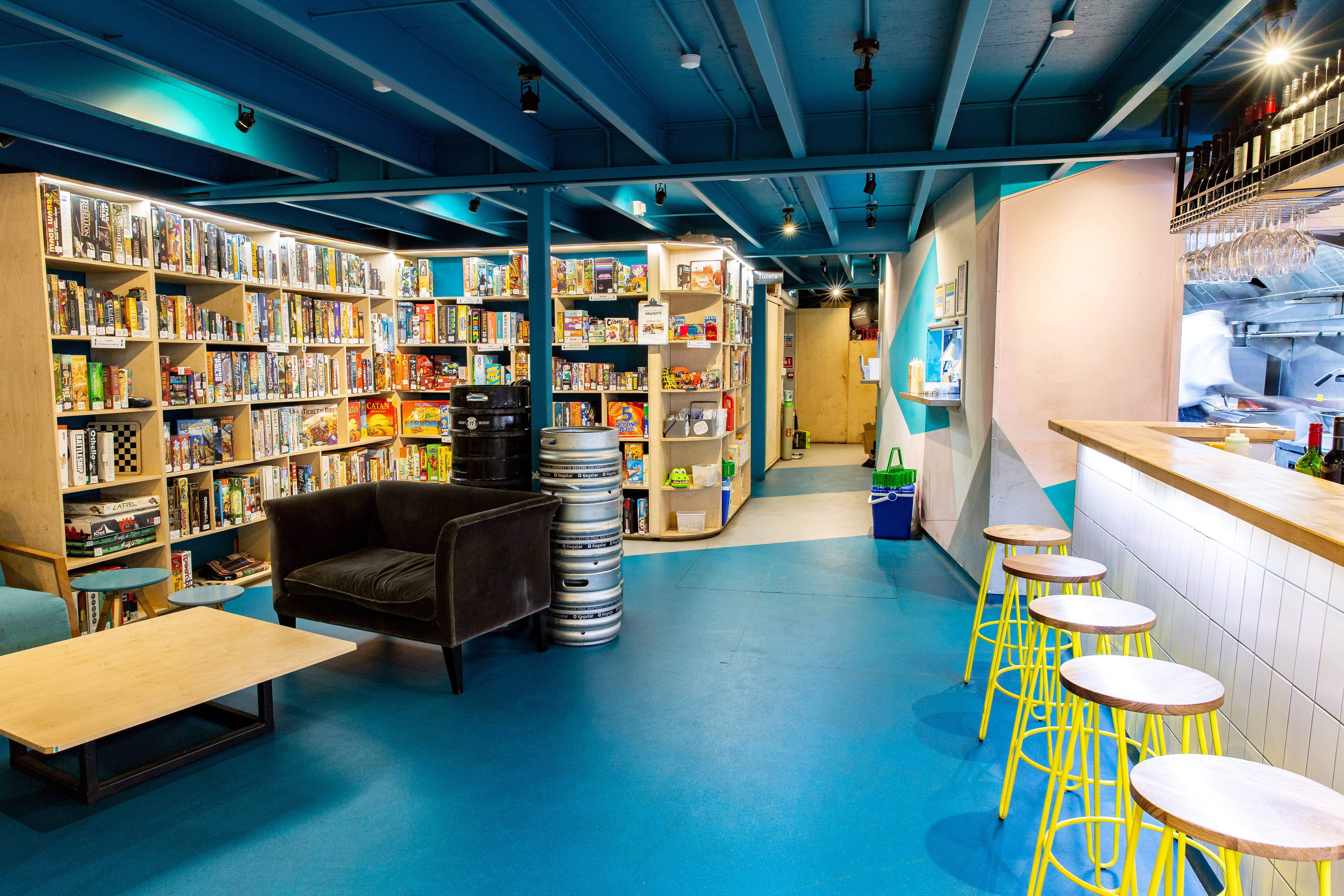 Vibrant multifunctional venue in Draughts Waterloo for casual meetings and events.