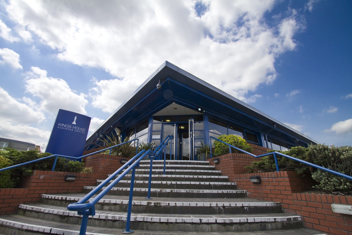 Modern King Charles Theatre entrance with staircase, ideal for corporate events and meetings.