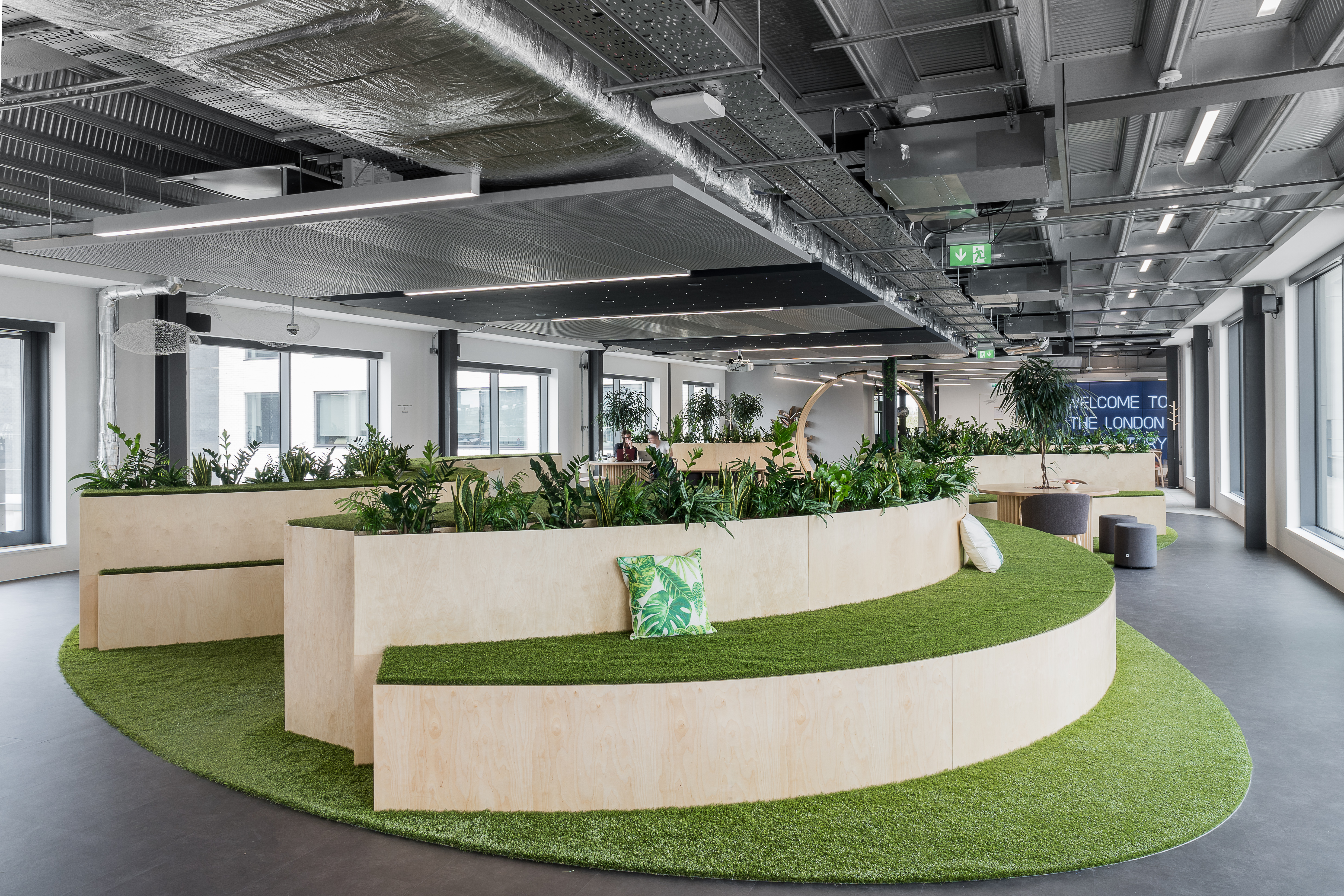 Modern meeting space in London with tiered seating for collaborative gatherings.