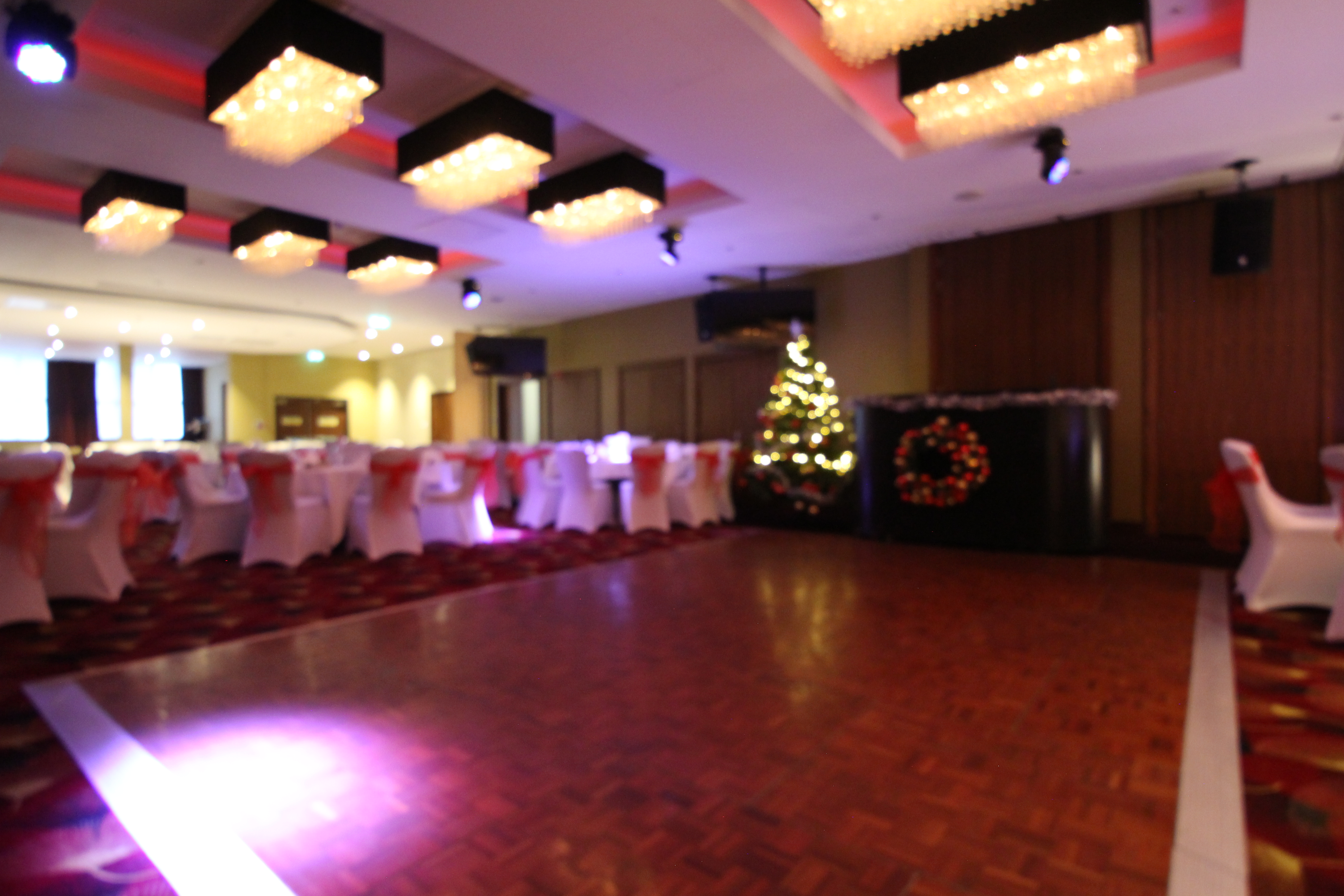 Elegant event space with Christmas tree for festive holiday parties in London.