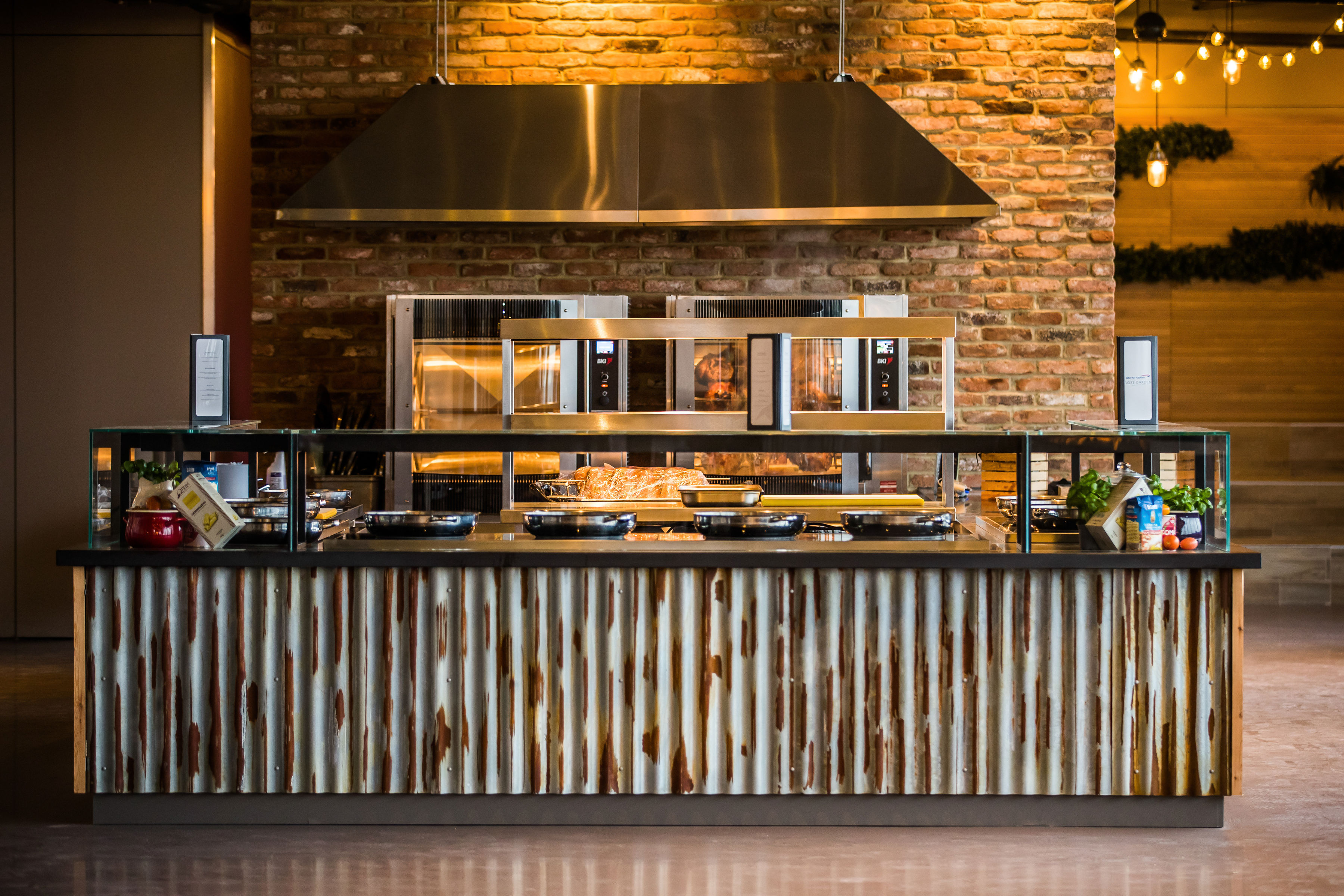 British Airways Rose Garden catering station, rustic design, ideal for networking events.