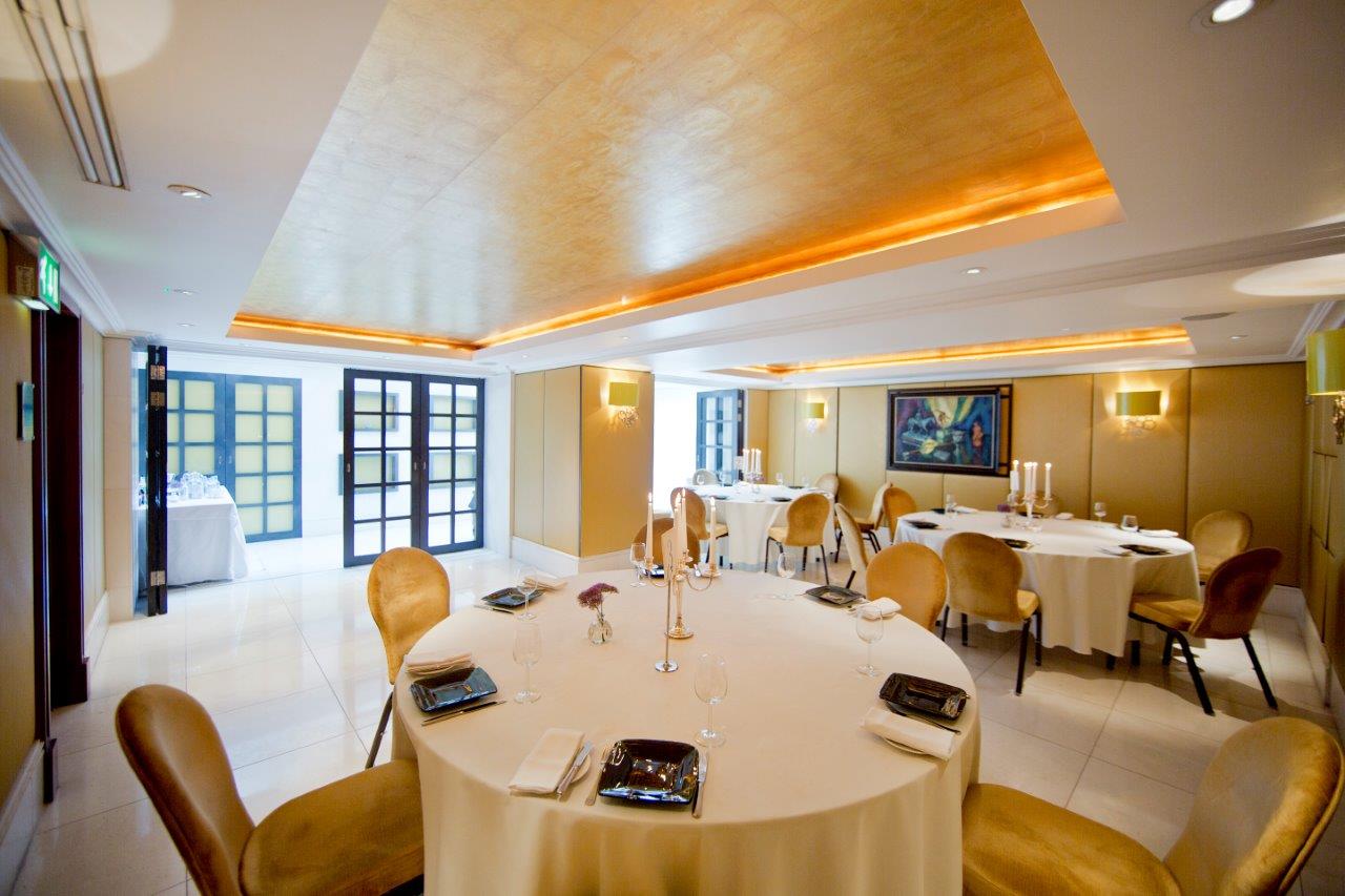 Elegant Mayfair Suite dining space for upscale corporate dinners and exclusive events.
