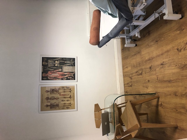 Minimalist consultation room at Marcophysio Westferry for wellness events and workshops.