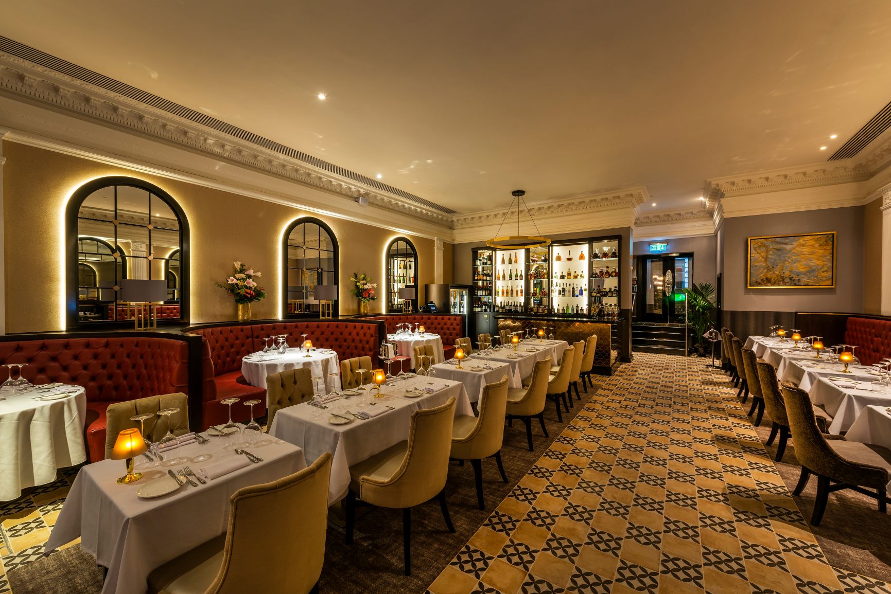 Elegant restaurant setting with plush seating for intimate dinners and corporate events.