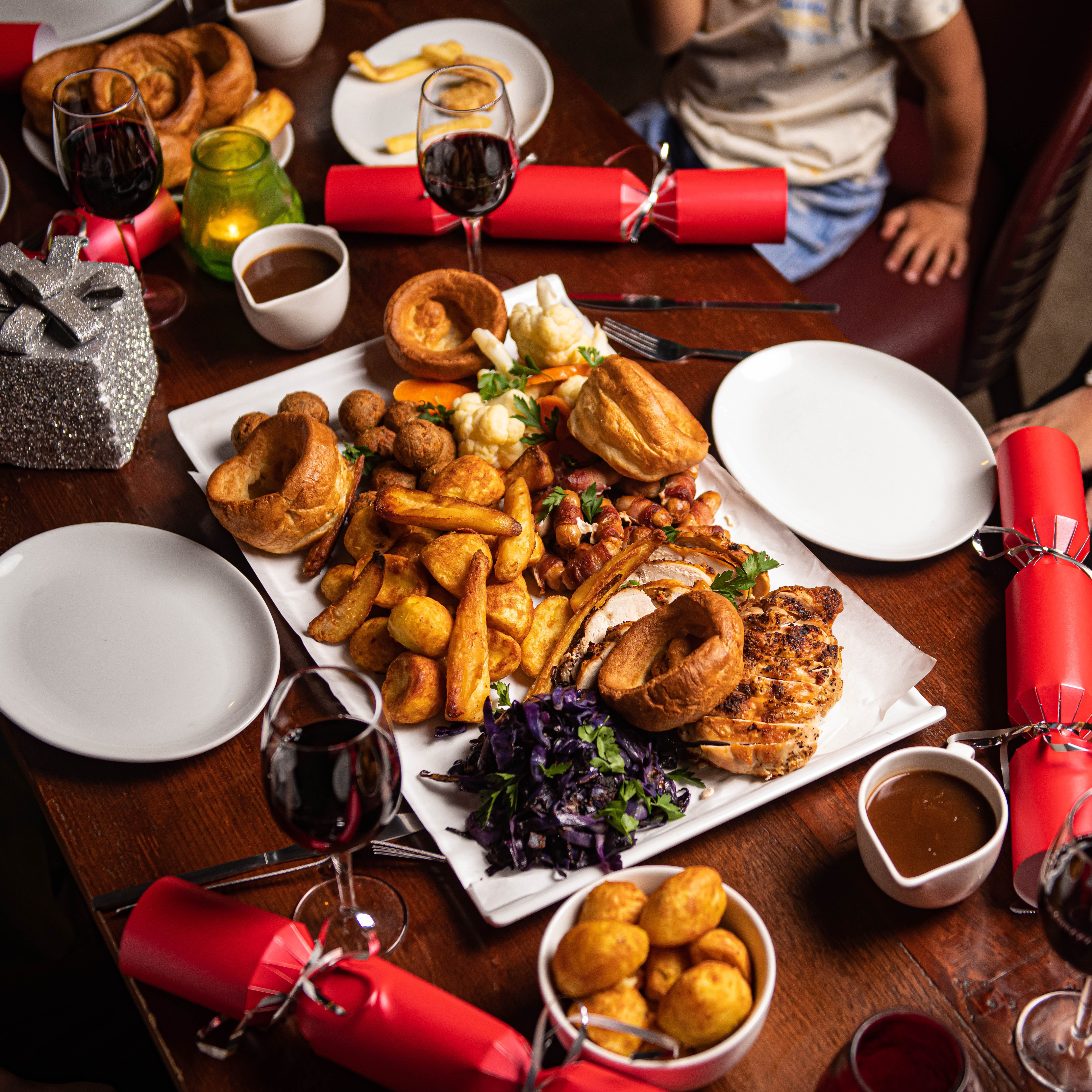 Festive corporate meal with roasted meats and vibrant vegetables at Punch Tarmey's Liverpool.