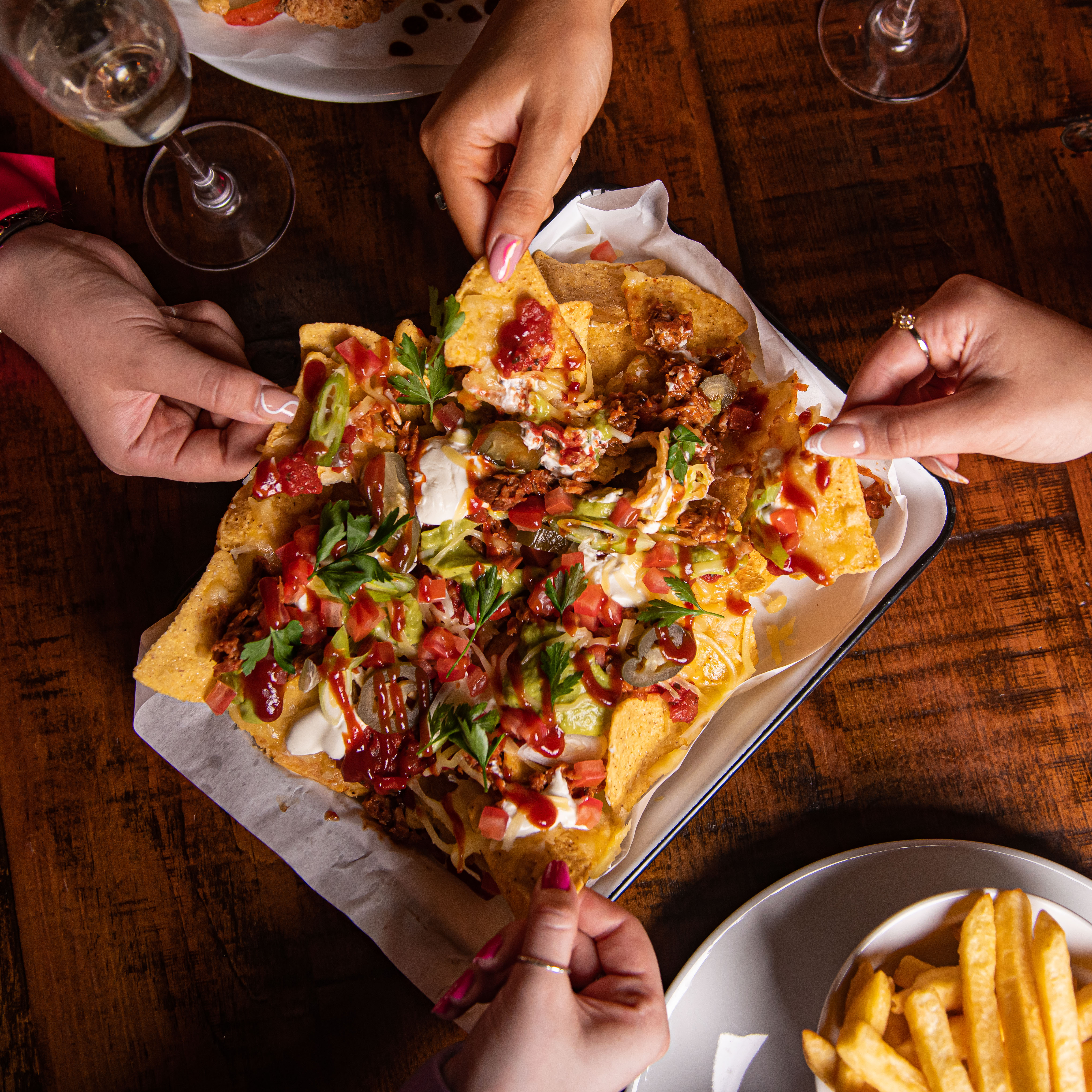 Vibrant nacho platter at Punch Tarmey's Liverpool for social gatherings and networking.