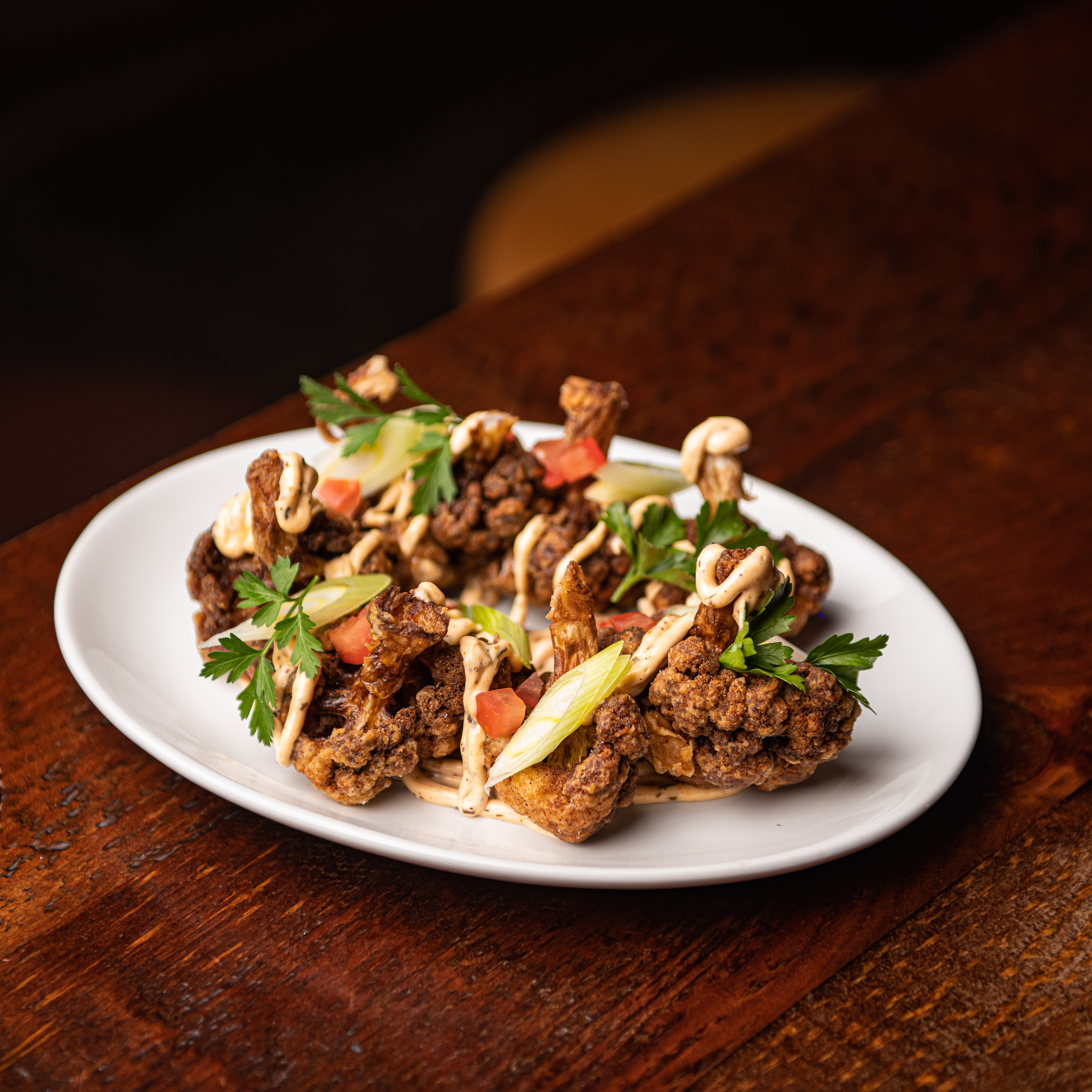 Elegant meat dish with herbs, ideal for networking events and receptions in Liverpool.