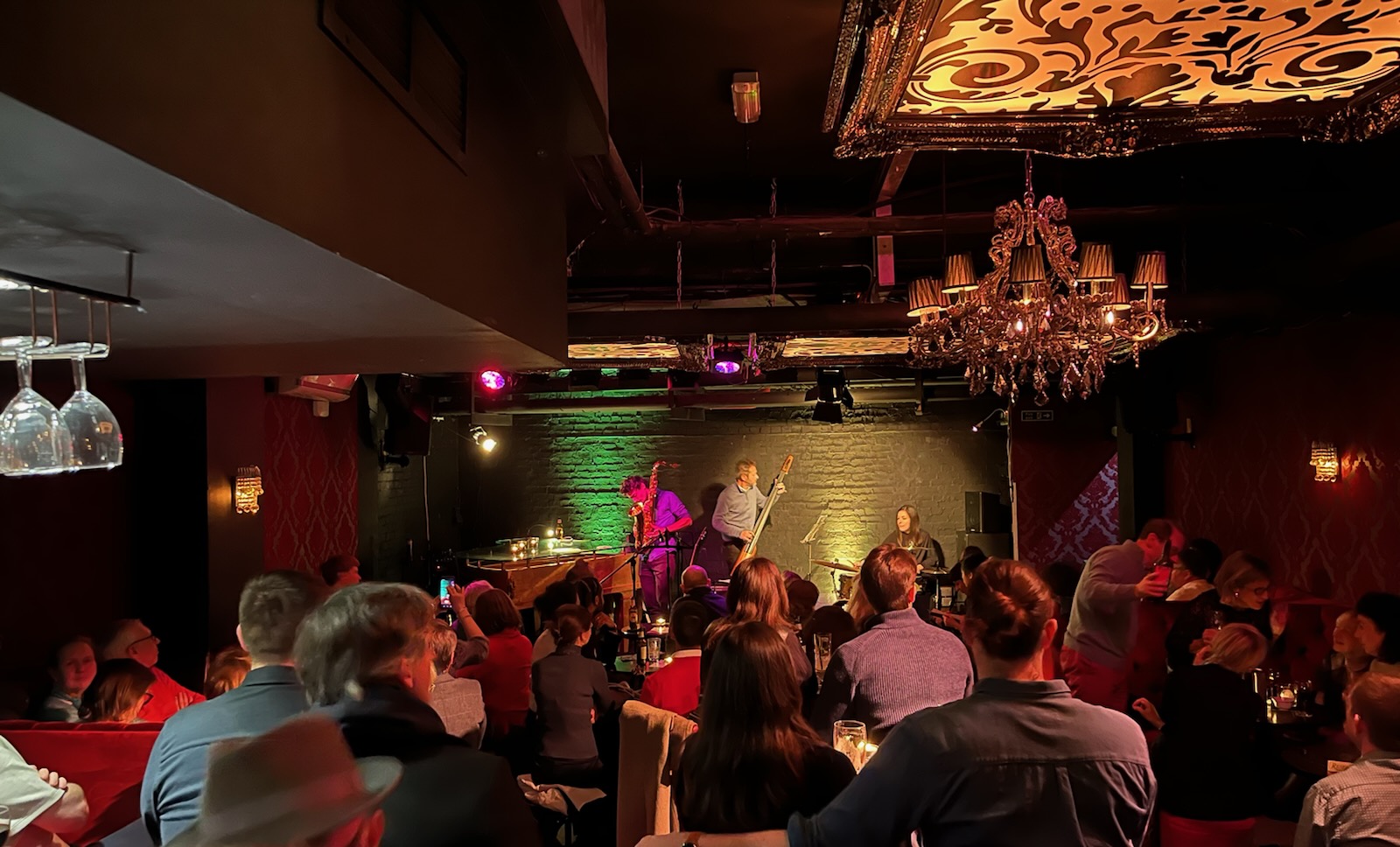 Vibrant event space at Piano Smithfield with engaged audience for performances and networking.