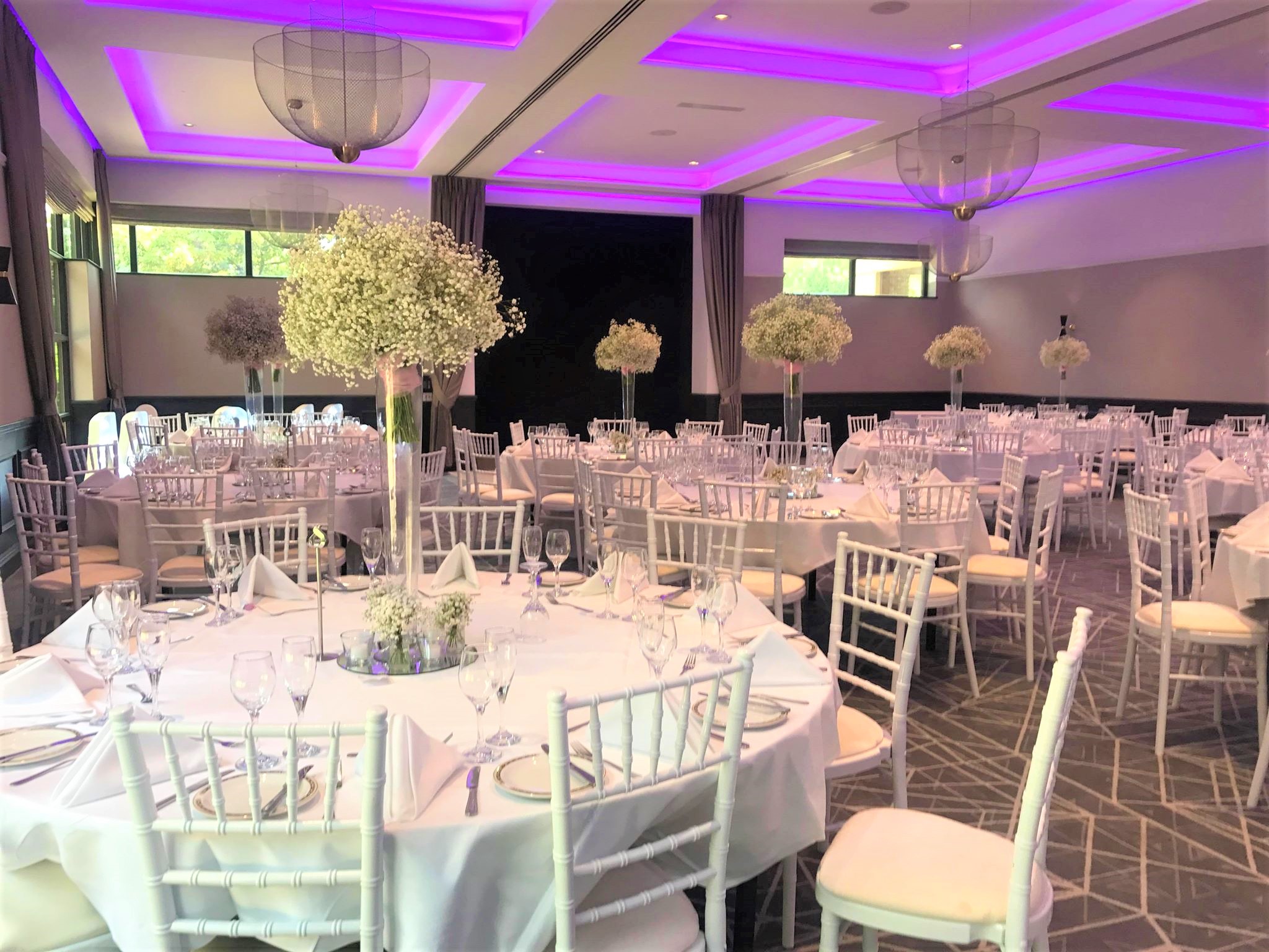 Elegant Princess Suite at Denham Grove, ideal for weddings with floral centerpieces.