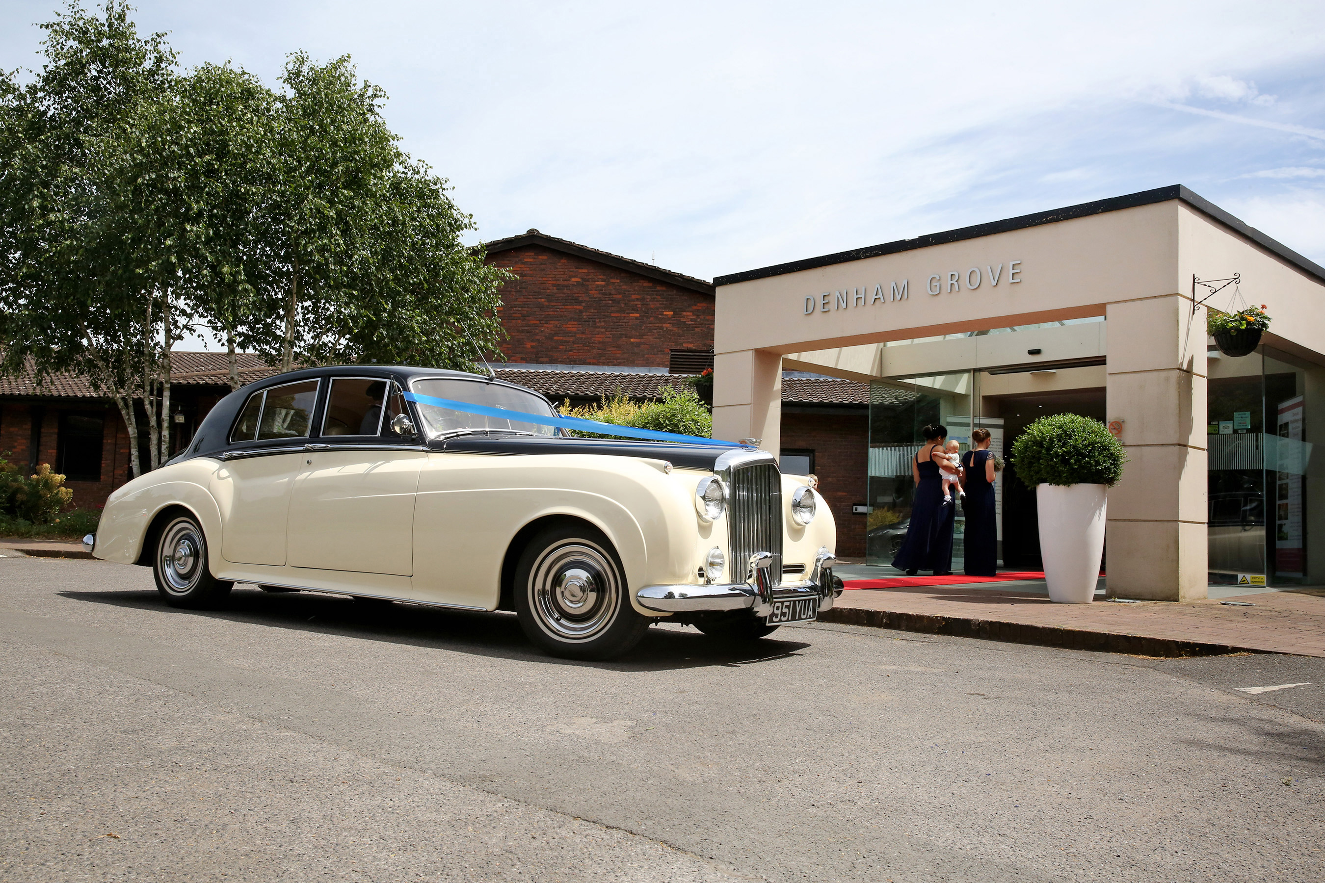 Luxury car outside Denham Grove's Princess Suite, perfect for weddings and upscale events.