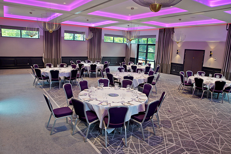 Princess Suite at Denham Grove with elegant round tables for corporate events and celebrations.