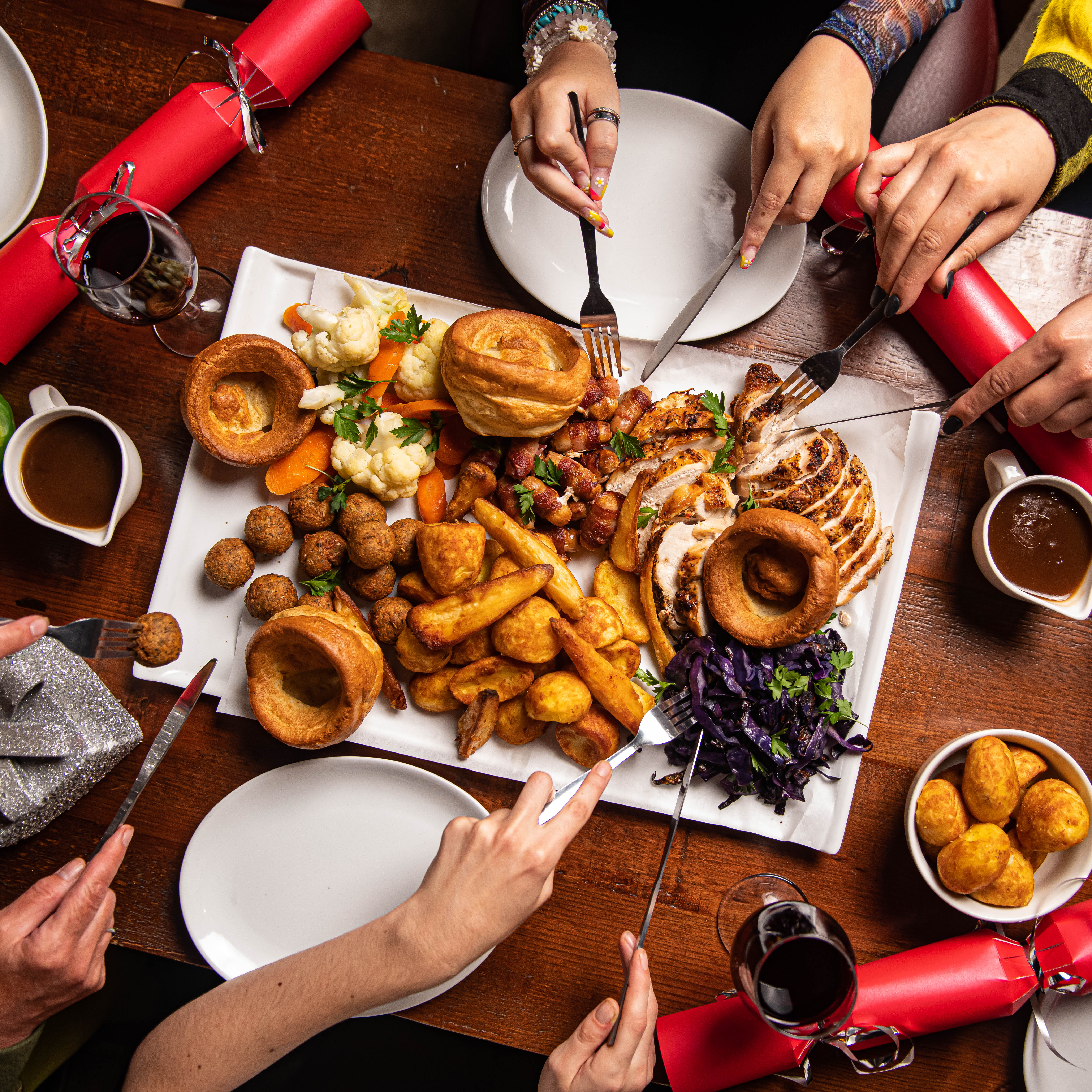 Brewery Hall banquet table with hearty dishes for festive gatherings in Liverpool.