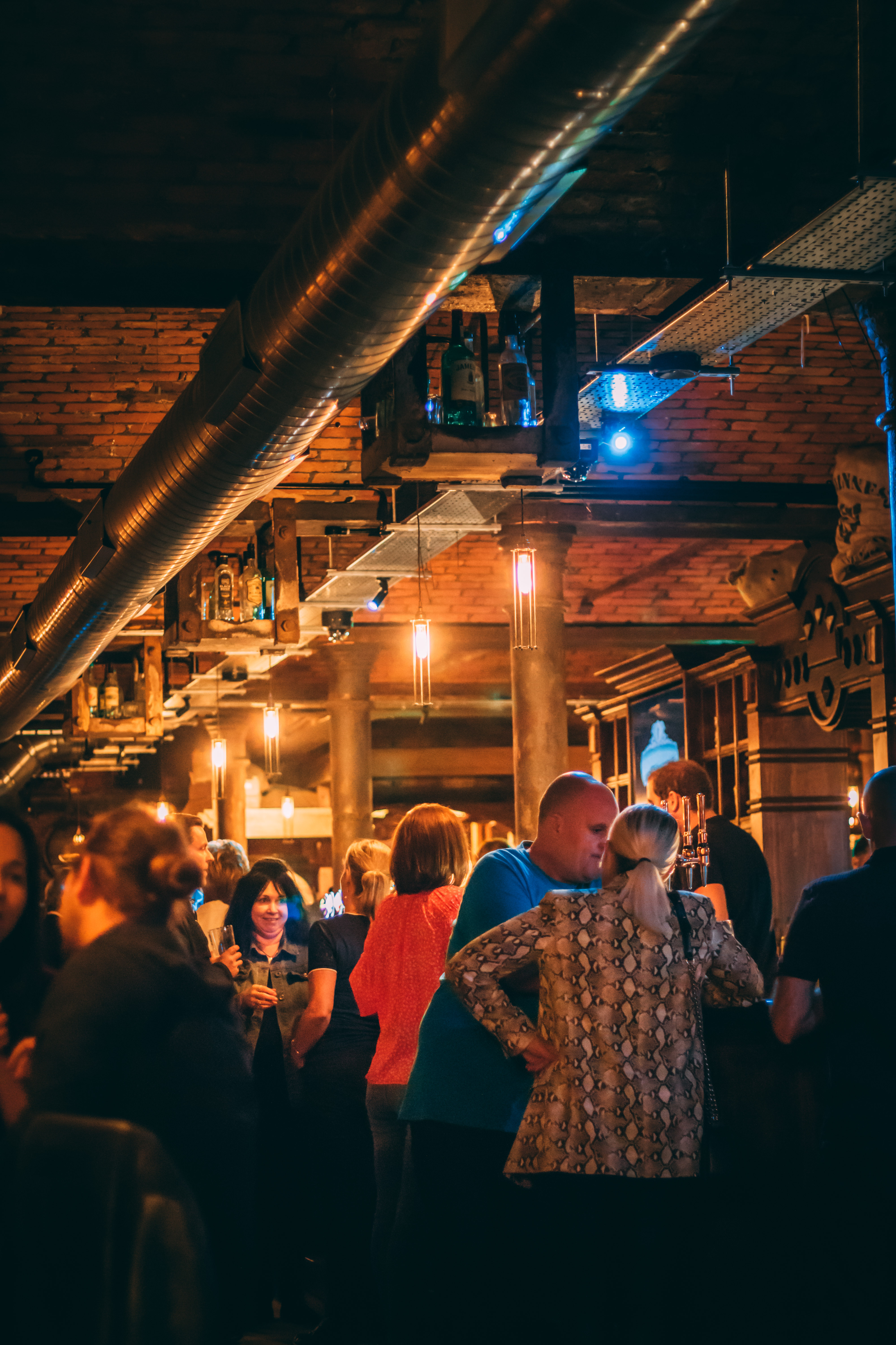 Brewery Hall networking event in Liverpool, featuring lively interactions and warm lighting.