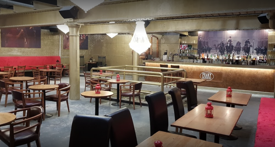 Upstairs bar in Peaky Blinders Liverpool, rustic ambiance for events and gatherings.