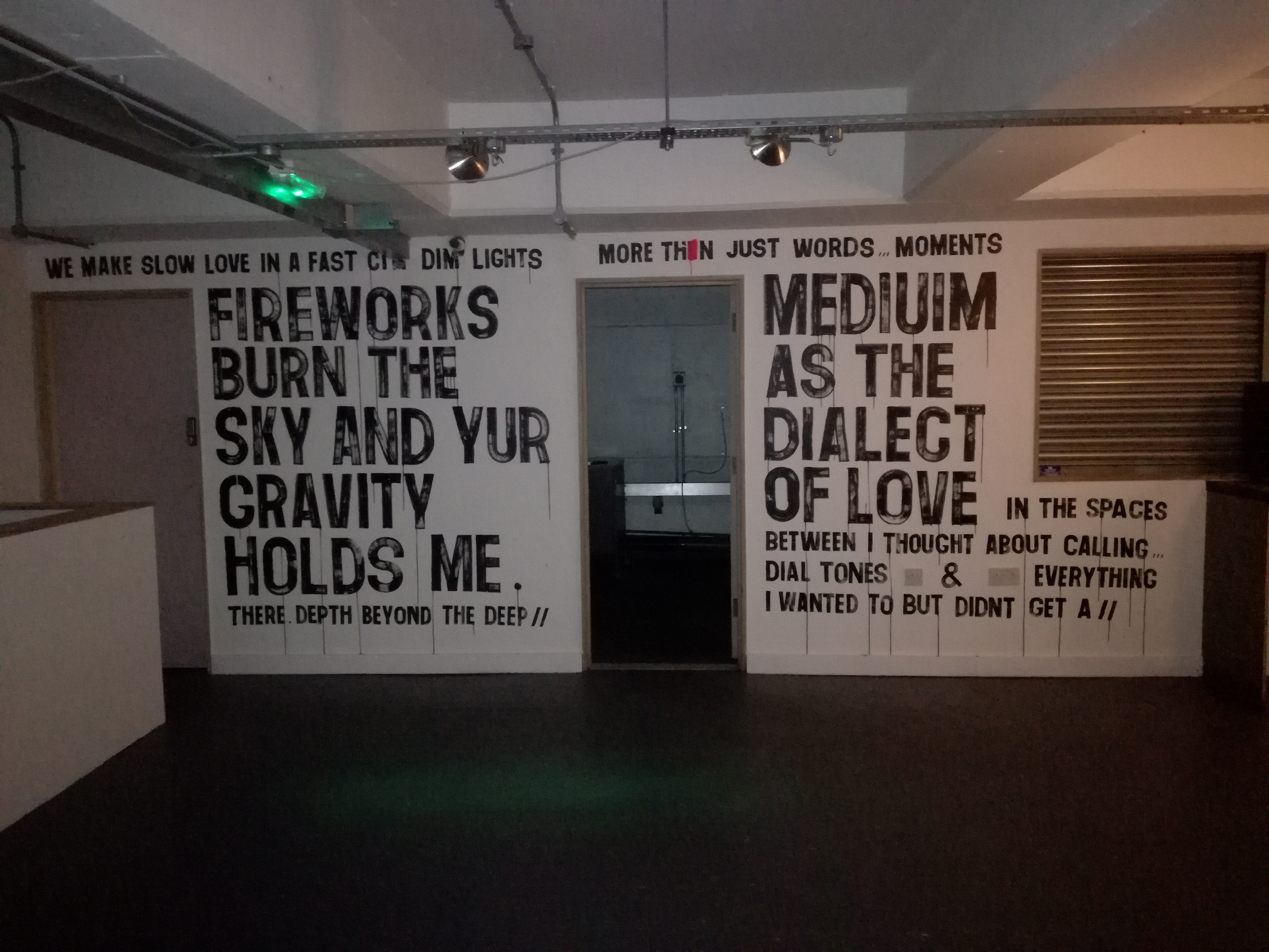 Main Space at Peckham Gallery, artistic wall text for intimate gatherings and workshops.