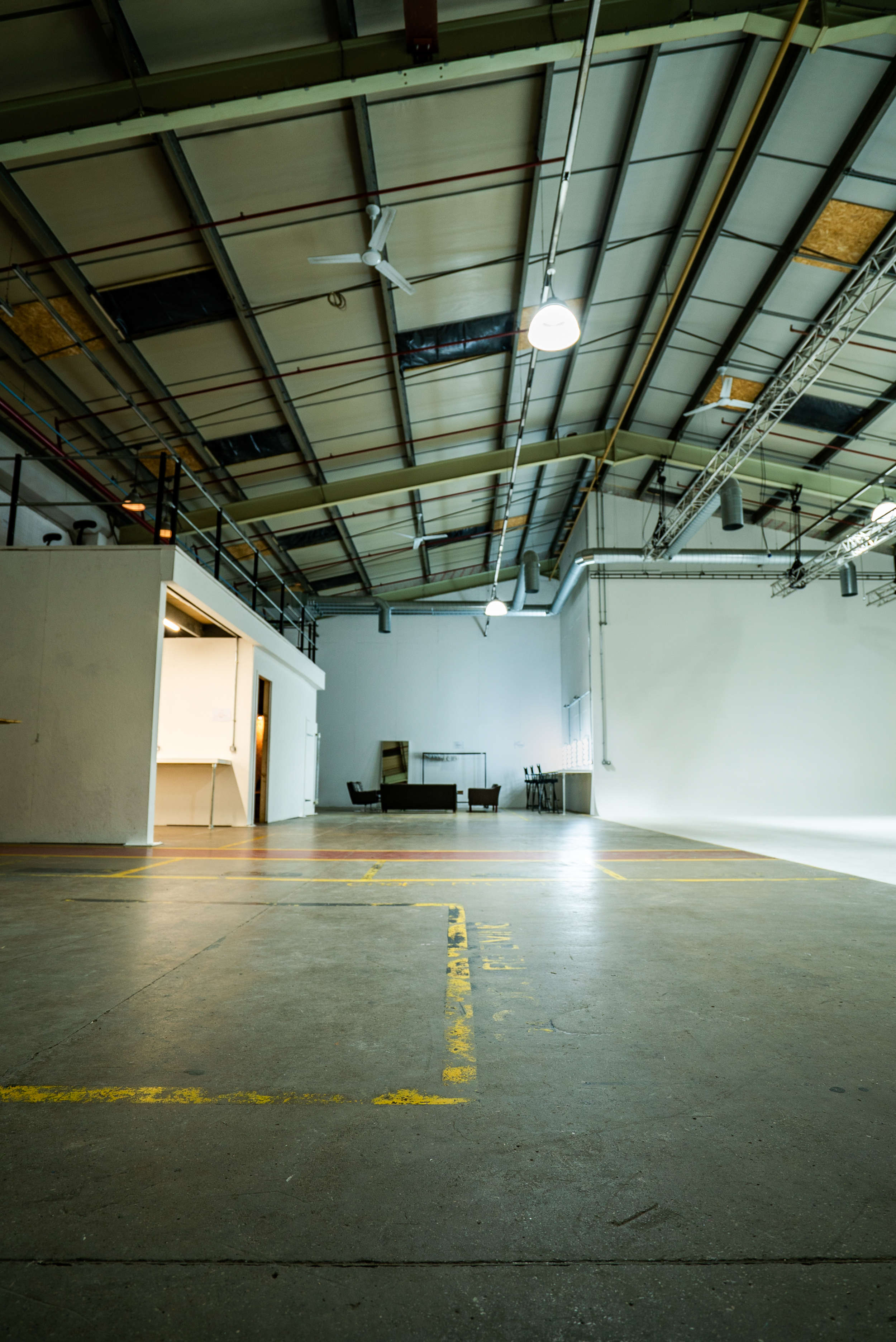 Versatile event space with high ceilings for meetings and workshops at [Un.titled] Studio.
