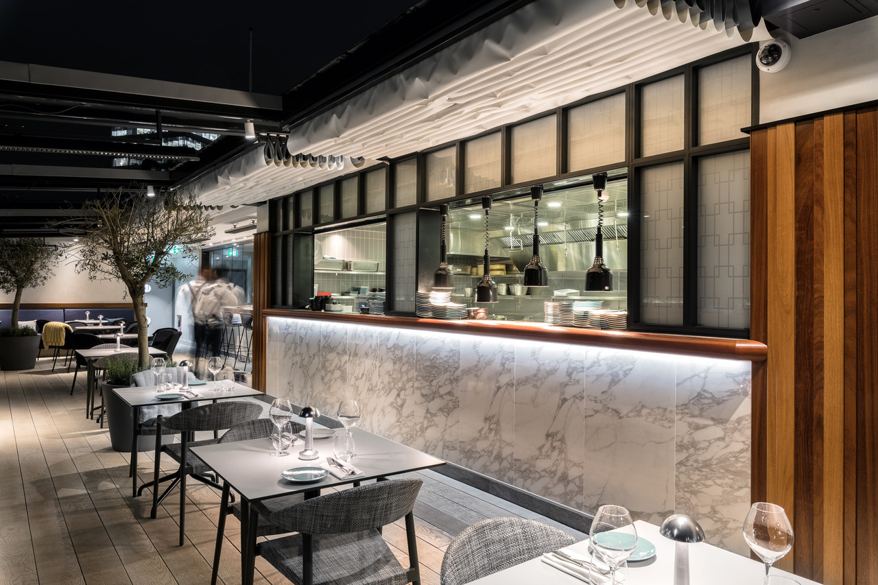 Modern restaurant interior at The Deck, ideal for corporate events and private dinners.