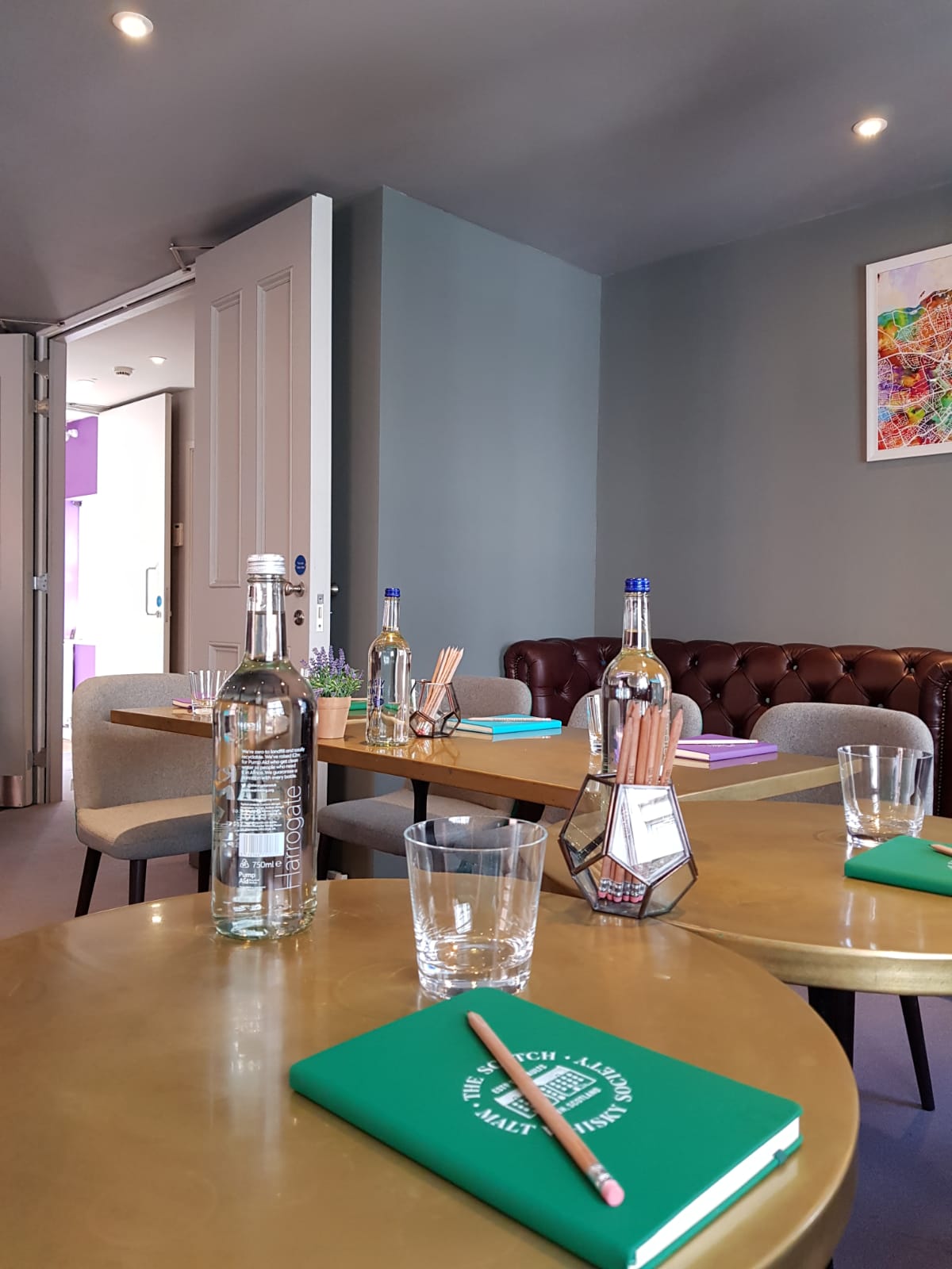 SMWS Private Room with polished wooden table, ideal for meetings and events.