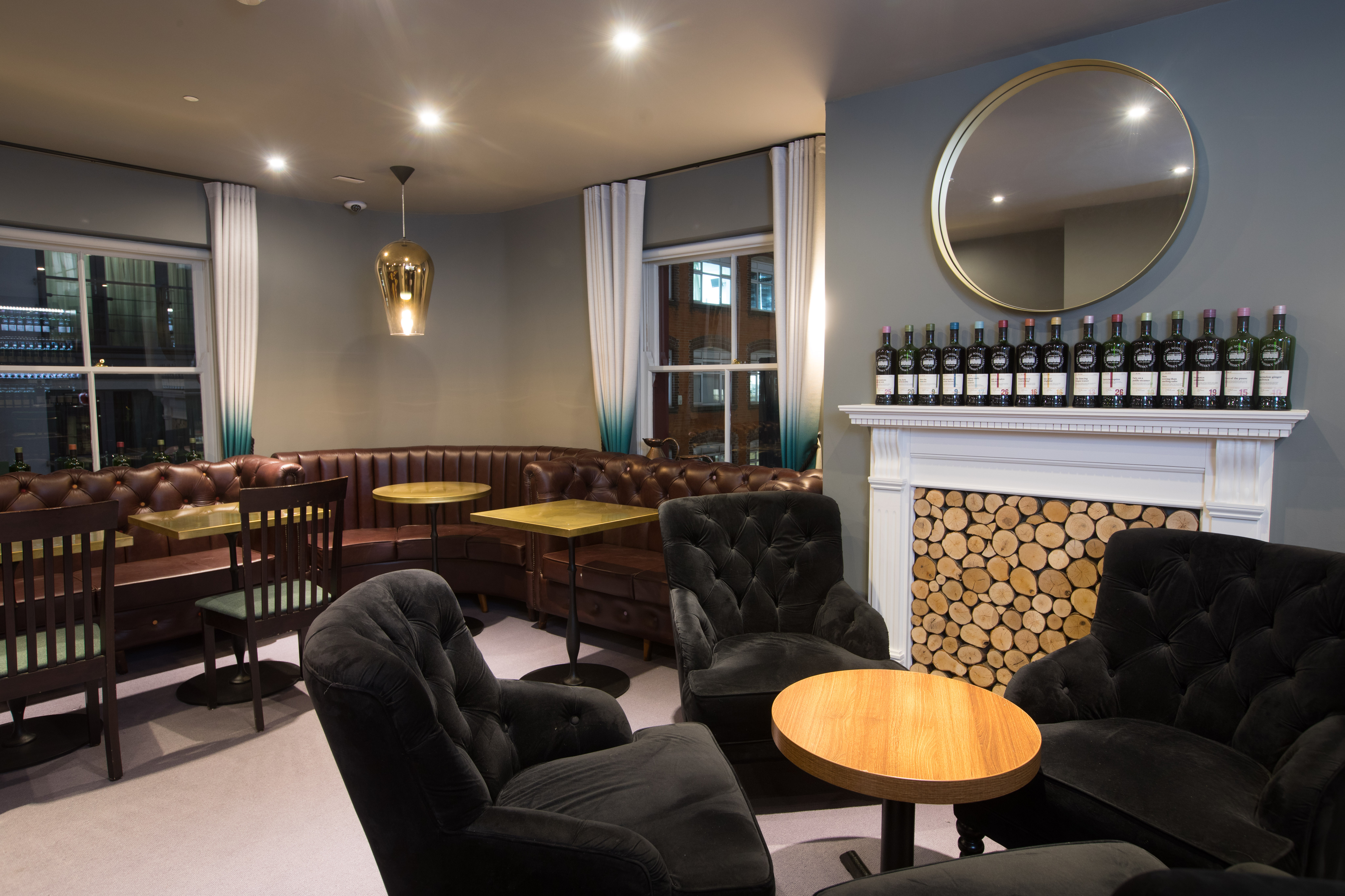 Intimate meeting space with plush seating at SMWS for networking events and gatherings.