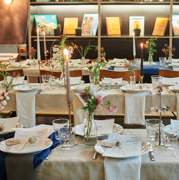 Elegant dining setup at Number 10 London with floral centerpieces for events.