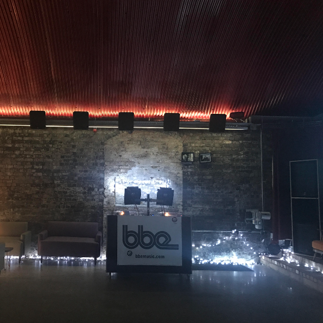Stylish event space at Number 10 London with ambient lighting and DJ booth.