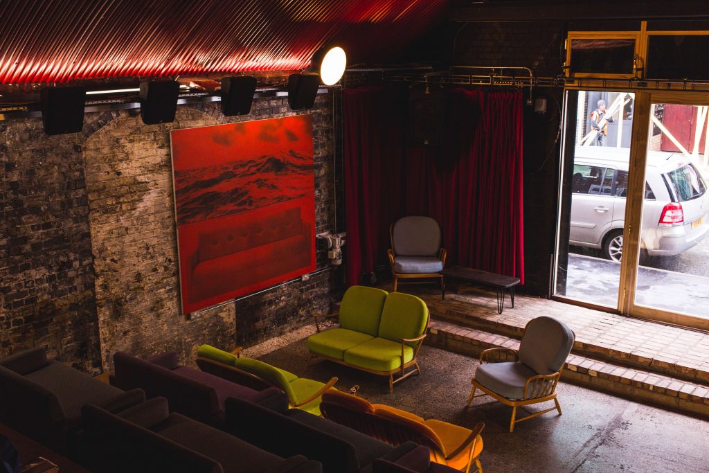 Versatile event space in Number 10 London with vibrant artwork for creative meetings.