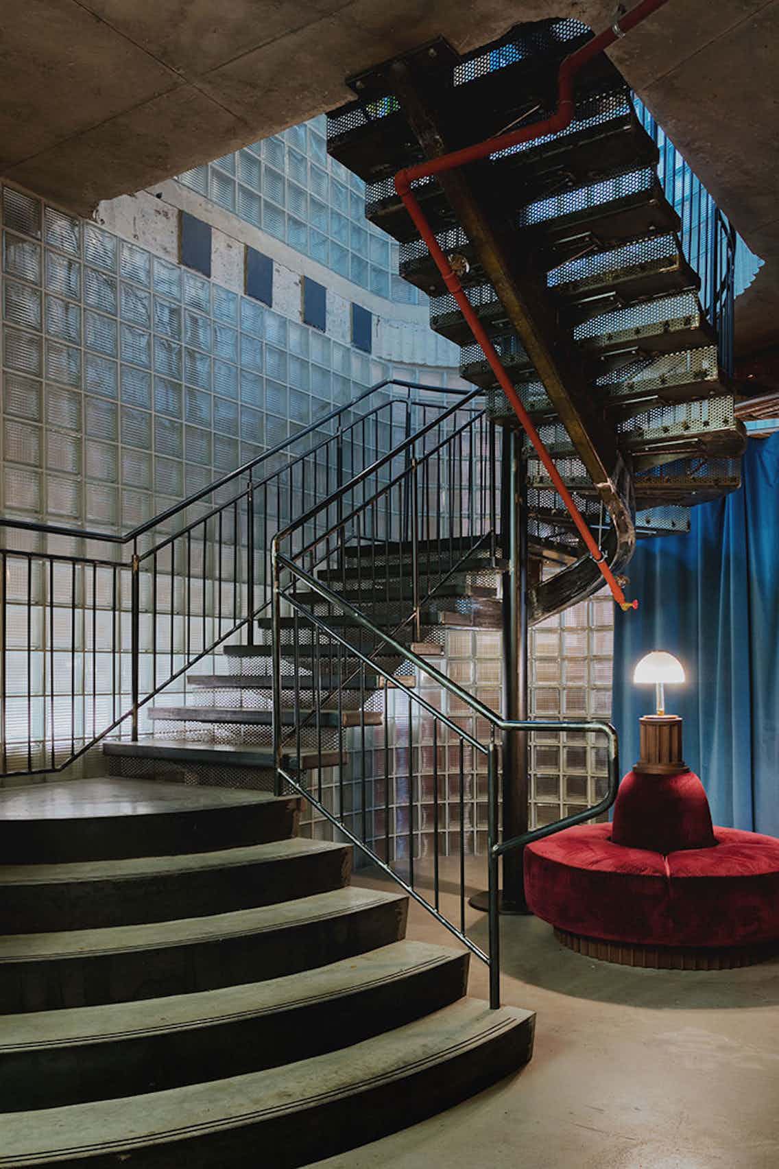 Stylish staircase in Lino's bar, ideal for creative events and networking.
