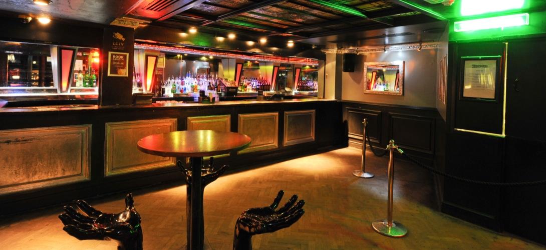 Stylish bar area in Zoo Bar, perfect for intimate gatherings and networking events.