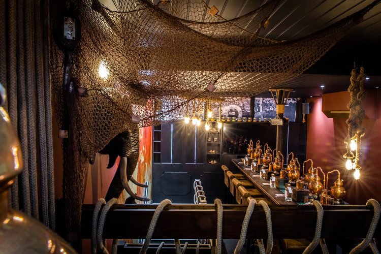 Nautical-themed dining space at Beach Rum Distillery for intimate events.