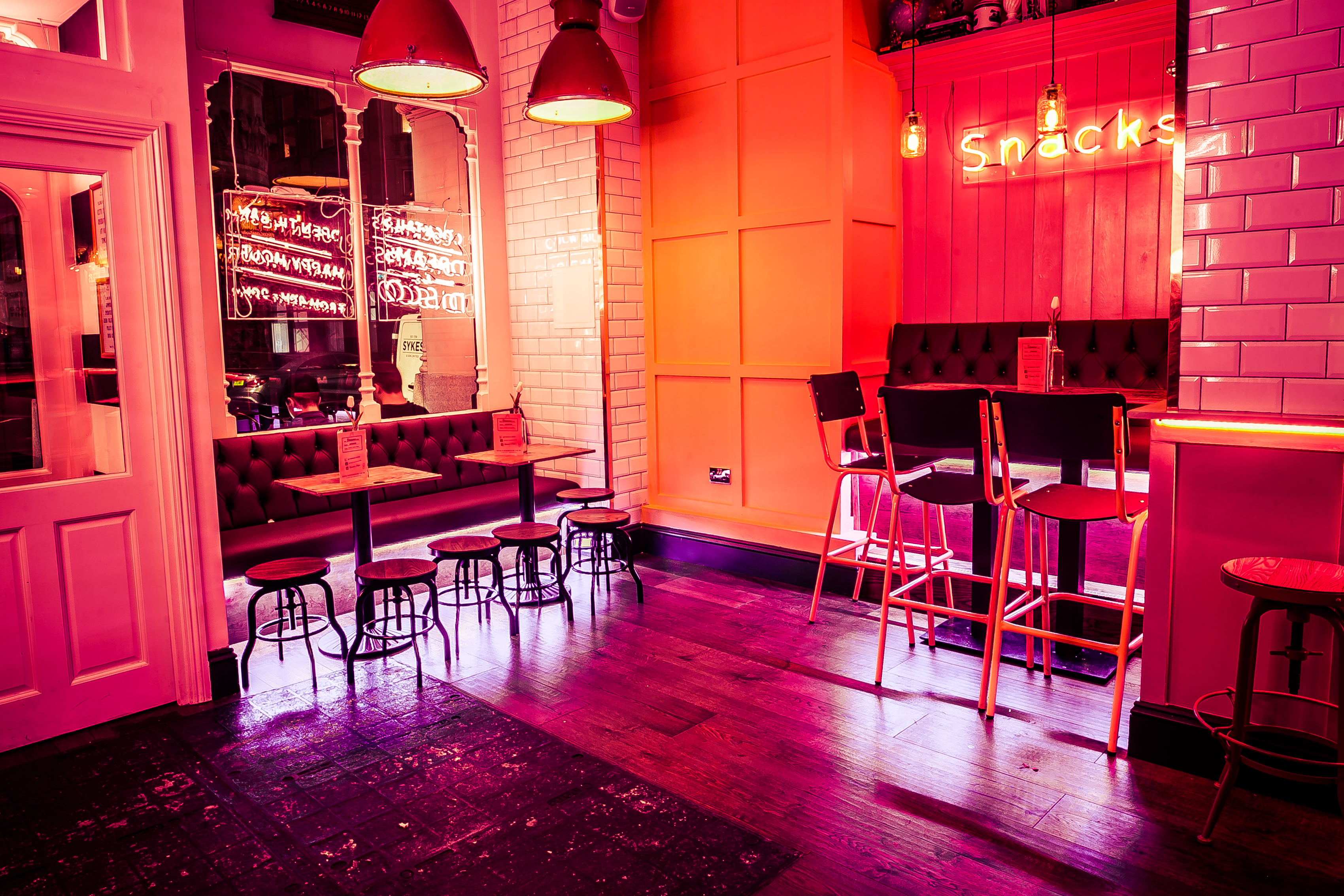 Vibrant modern venue with colorful decor for casual meetings and networking events.