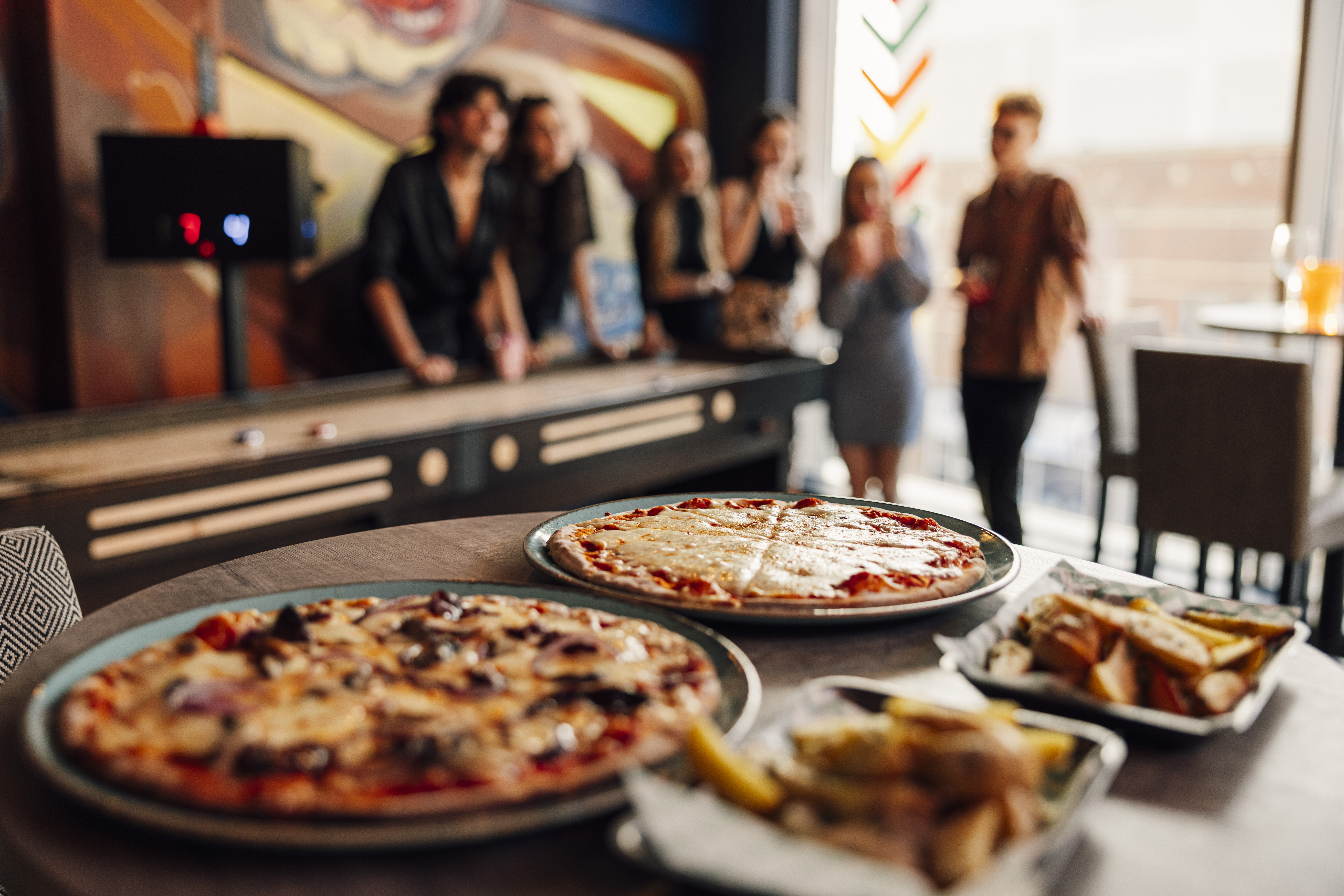 Vibrant event space at Caddies Southend for casual dining and networking.