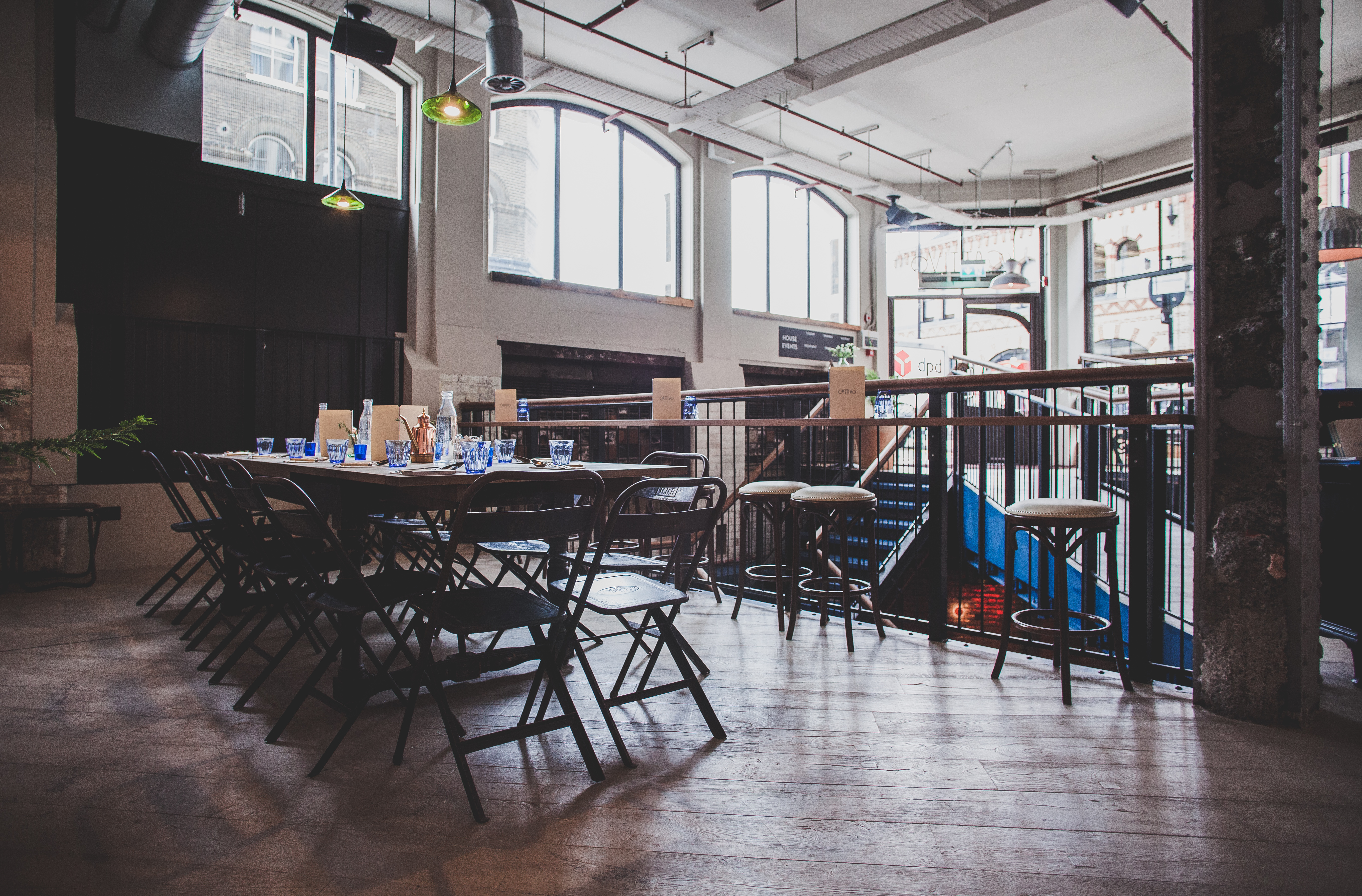 Versatile event space at Pacifica Burger & Cocktail Bar with natural light for gatherings.