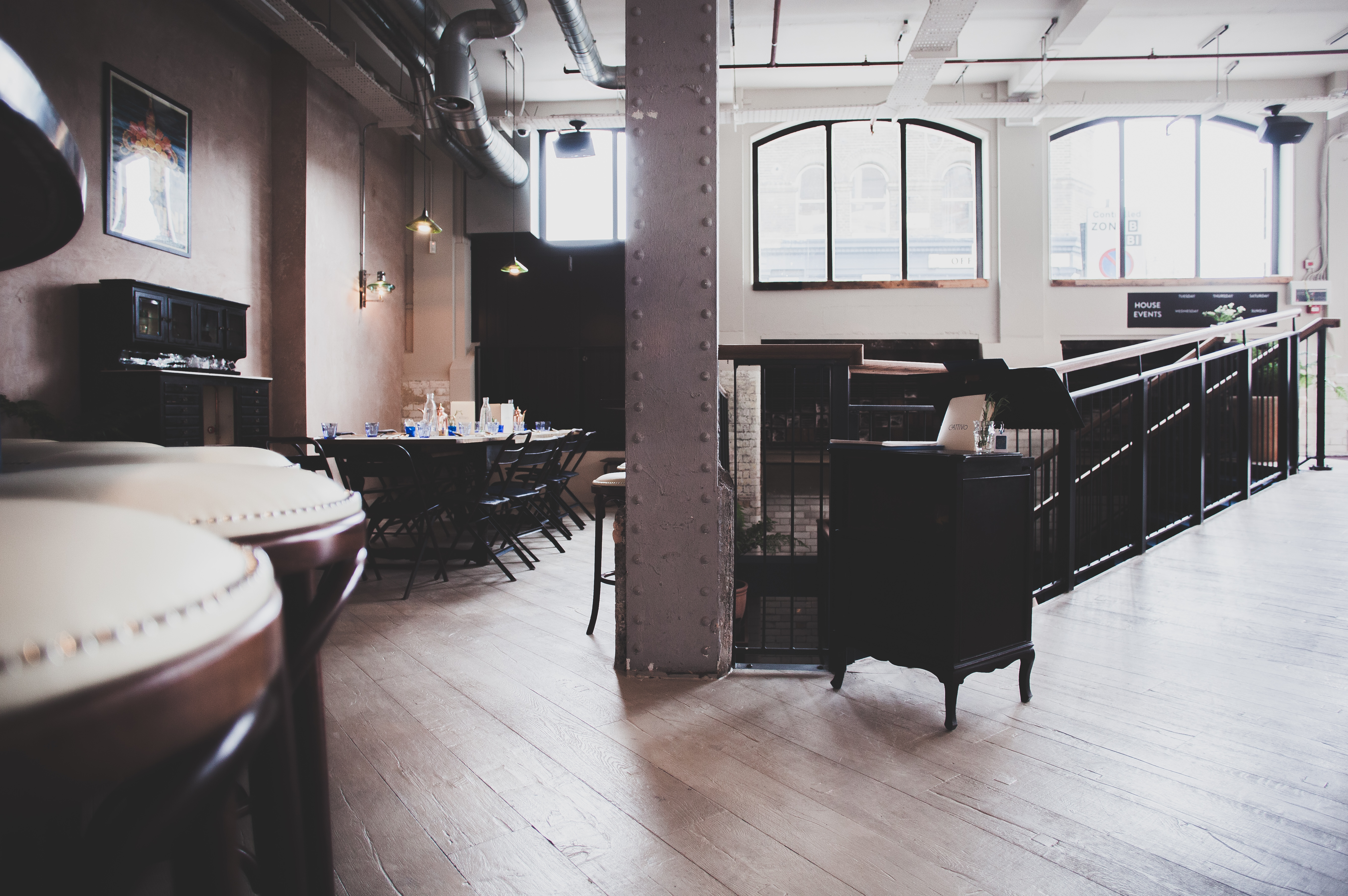 Stylish event space at Pacifica Burger & Cocktail Bar, perfect for networking and gatherings.