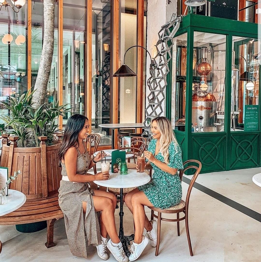 Vibrant café setting in Serata Hall for networking events and informal meetings.