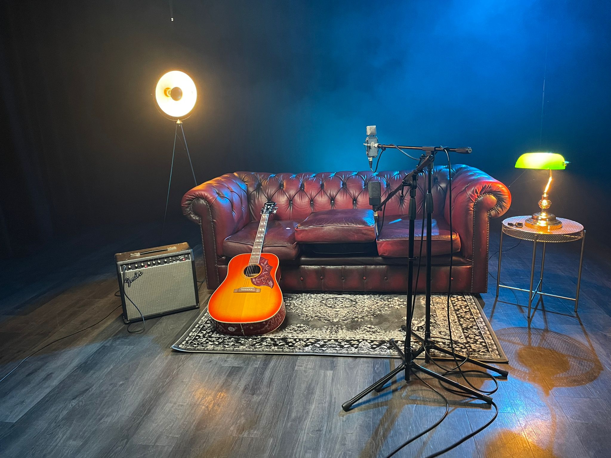 Cozy venue with vintage leather couch for intimate events and live music at Tileyard London.