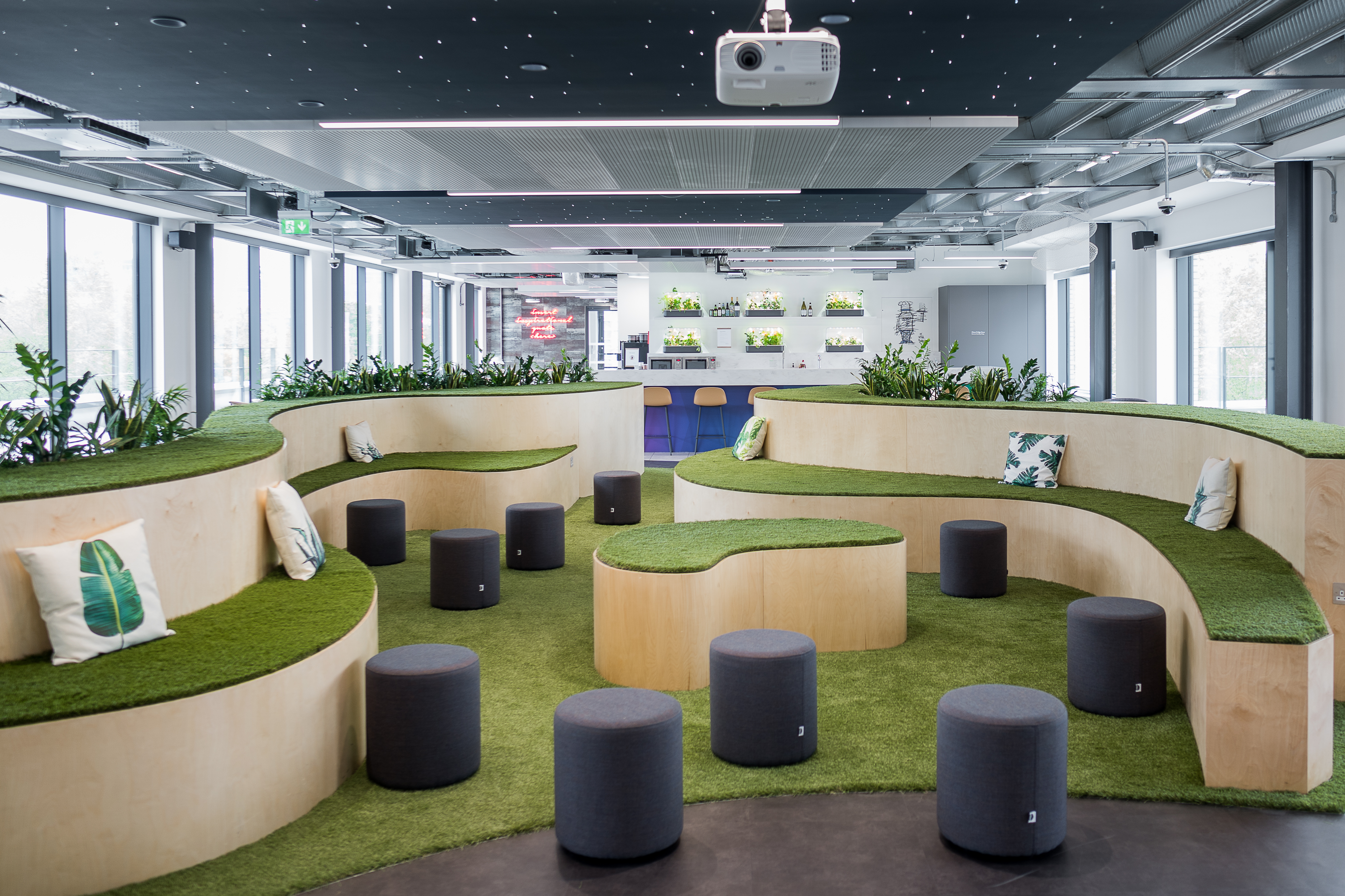 Modern meeting space with tiered seating for creative brainstorming in London.