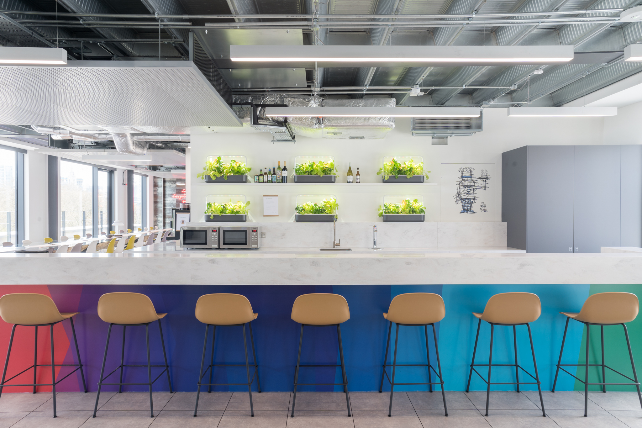 Modern kitchen in London venue, ideal for meetings and networking events with natural light.