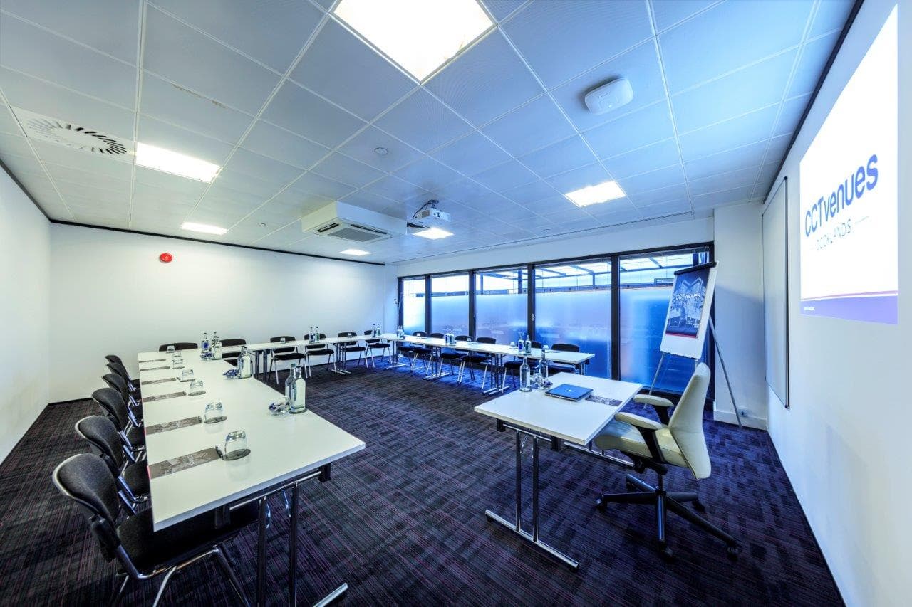 U-shaped Teak Room at Docklands Watersports Centre for corporate meetings and team workshops.