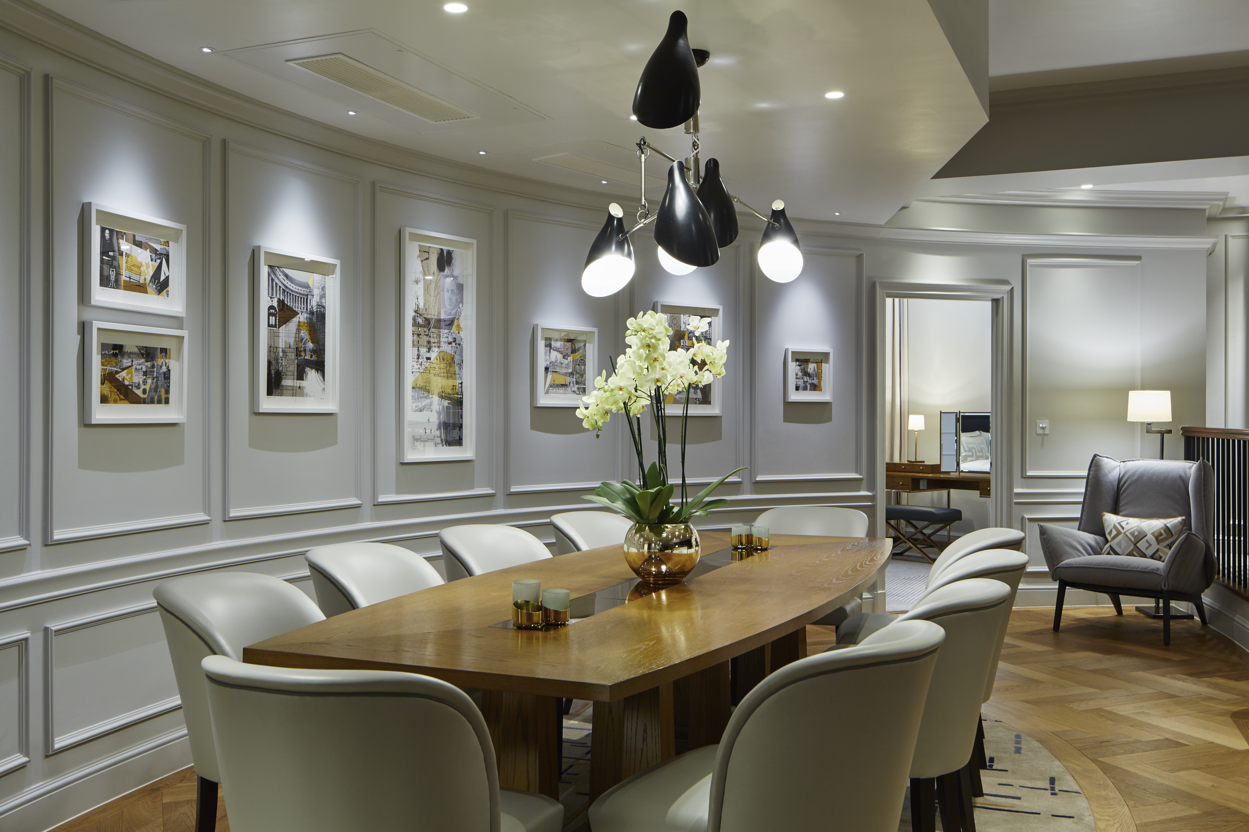 Westminster Suite at London Marriott: elegant meeting space with plush chairs for intimate events.